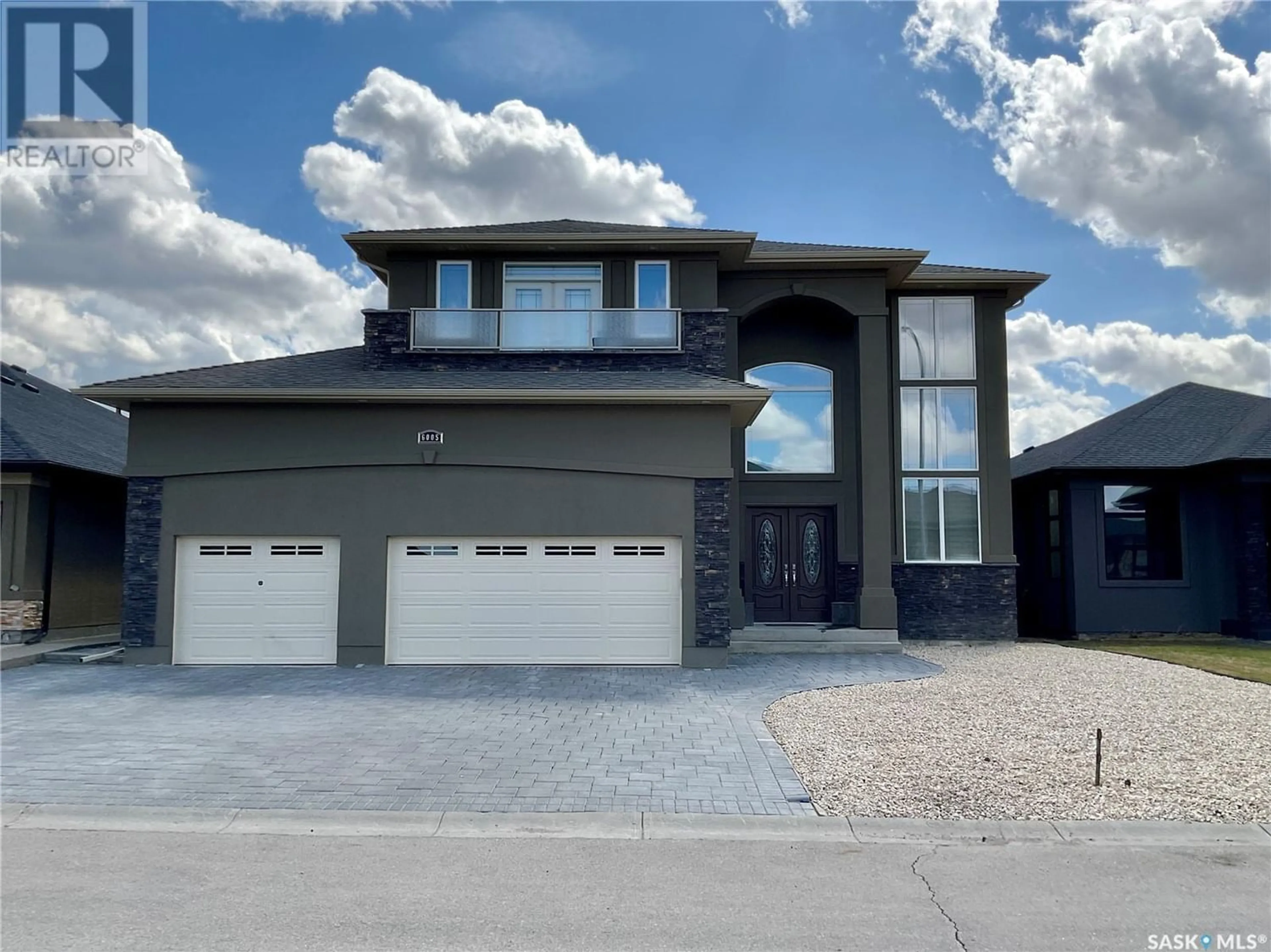 Frontside or backside of a home for 6005 Eagles COVE, Regina Saskatchewan S4X0H5