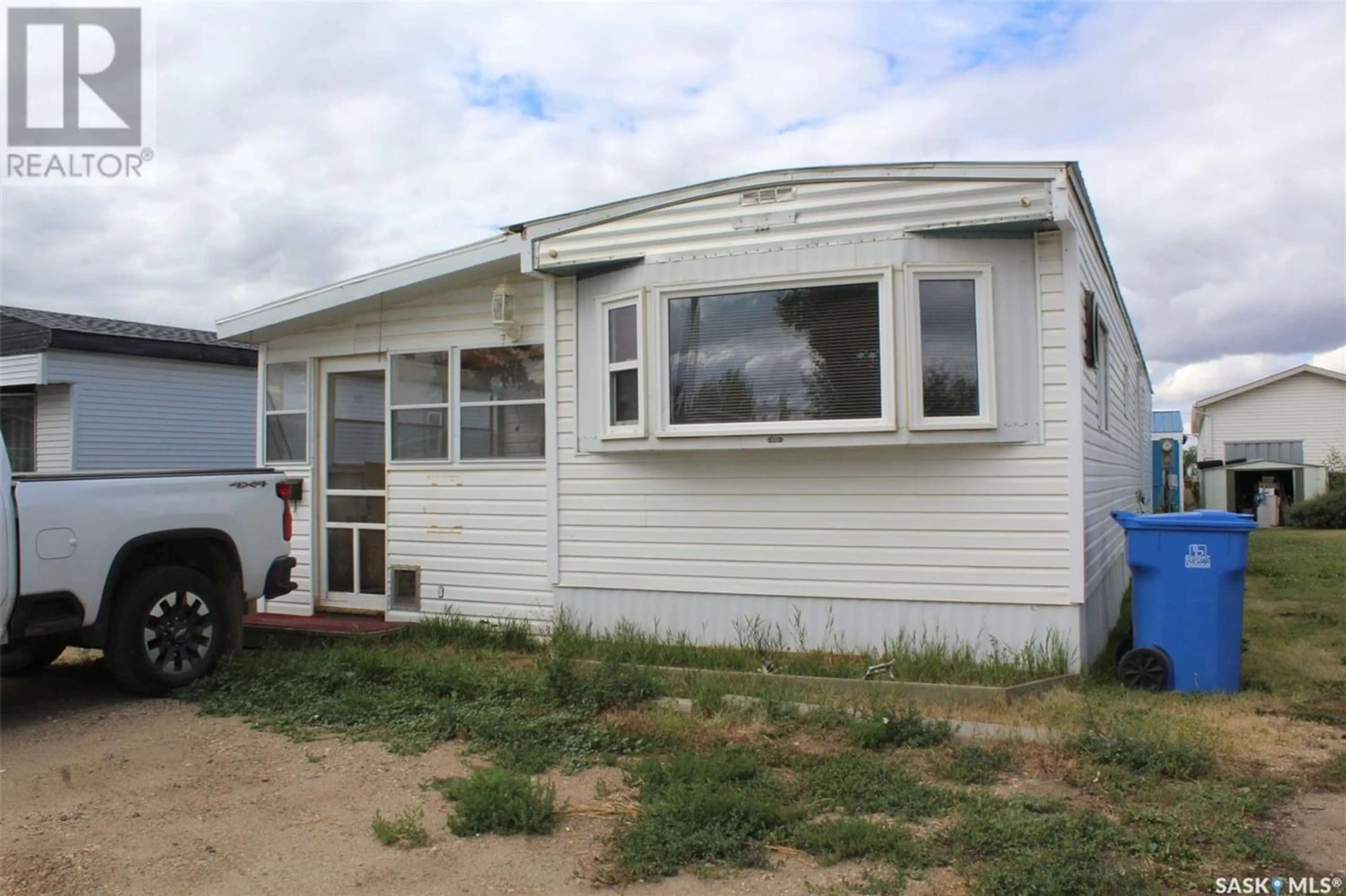 Frontside or backside of a home for 20 106 1st AVENUE, Weyburn Saskatchewan S4H2J1