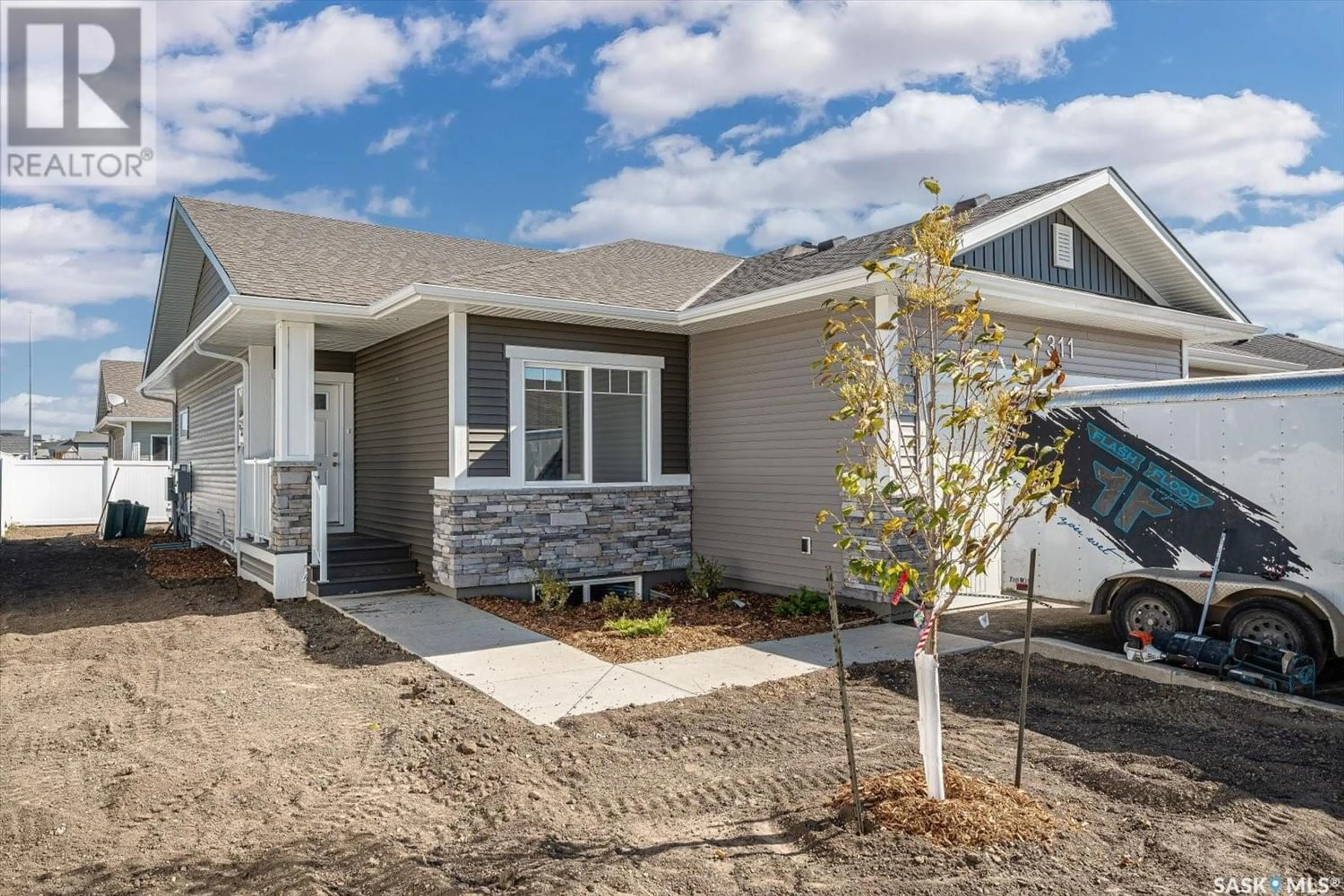Frontside or backside of a home for 311 170 Mirond ROAD, Martensville Saskatchewan S0K2T1