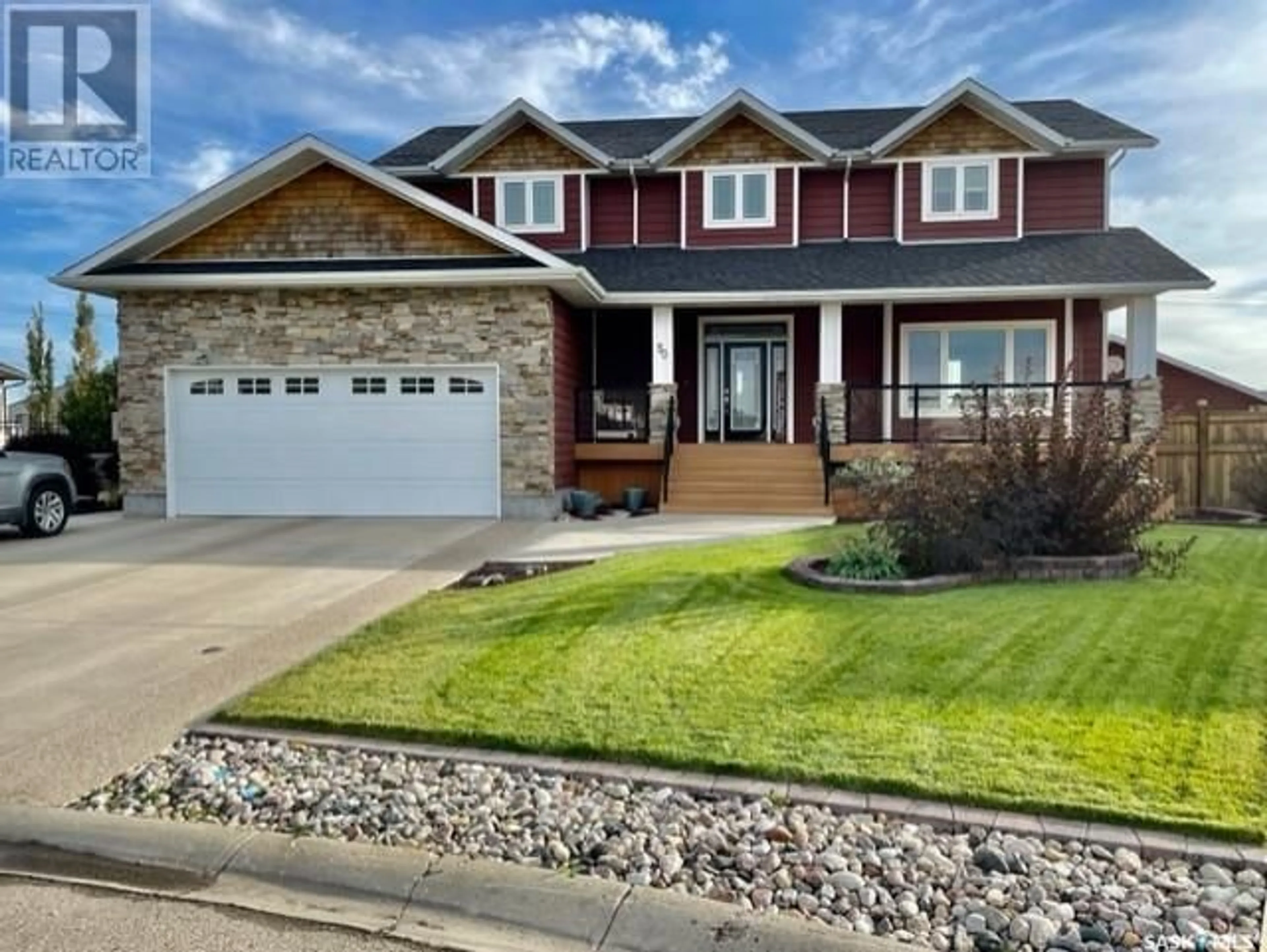 Frontside or backside of a home for 50 SHIELDS PLACE, Weyburn Saskatchewan S4H0C3