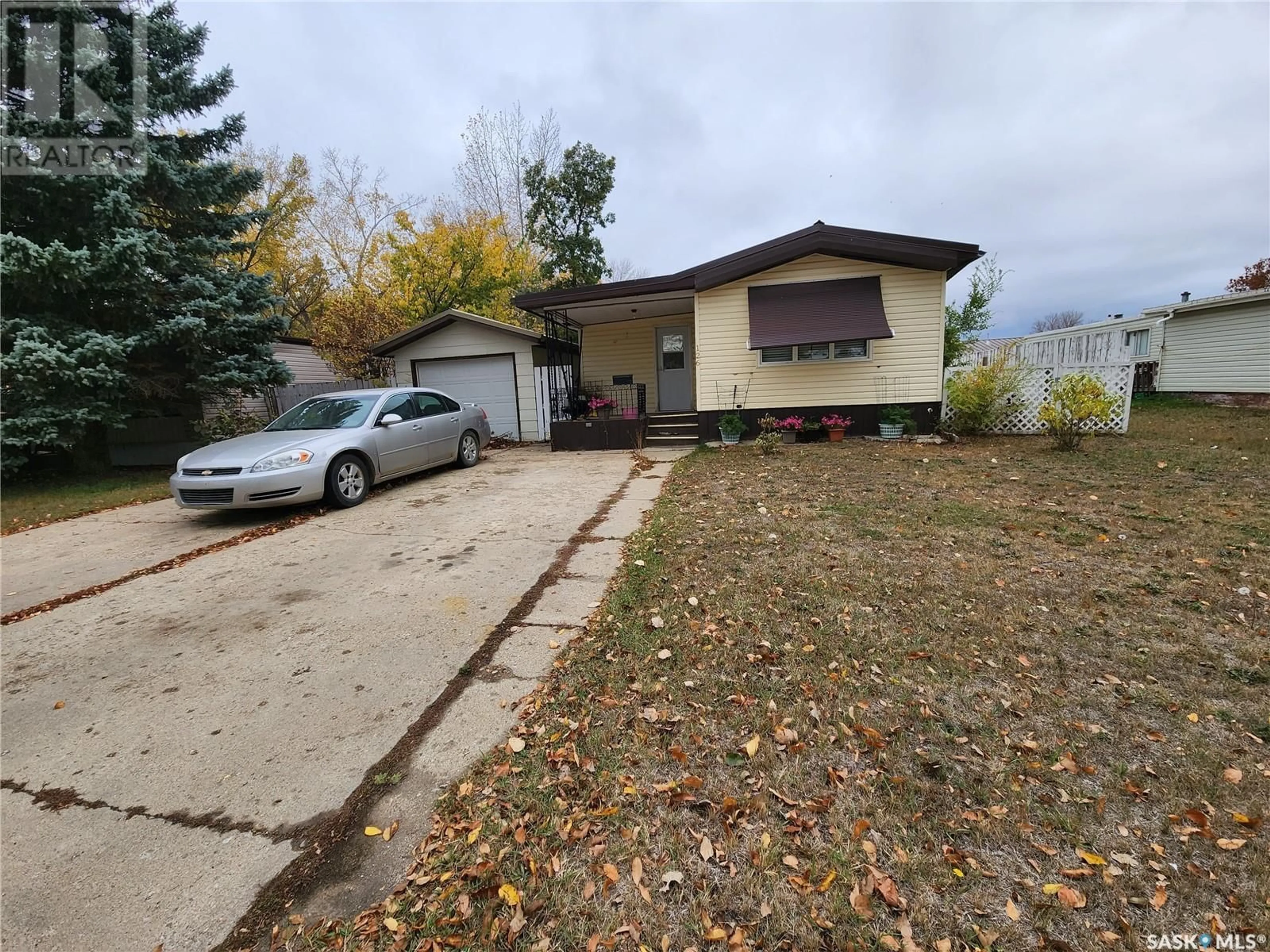 Frontside or backside of a home for 126 18TH STREET, Weyburn Saskatchewan S4H2W4