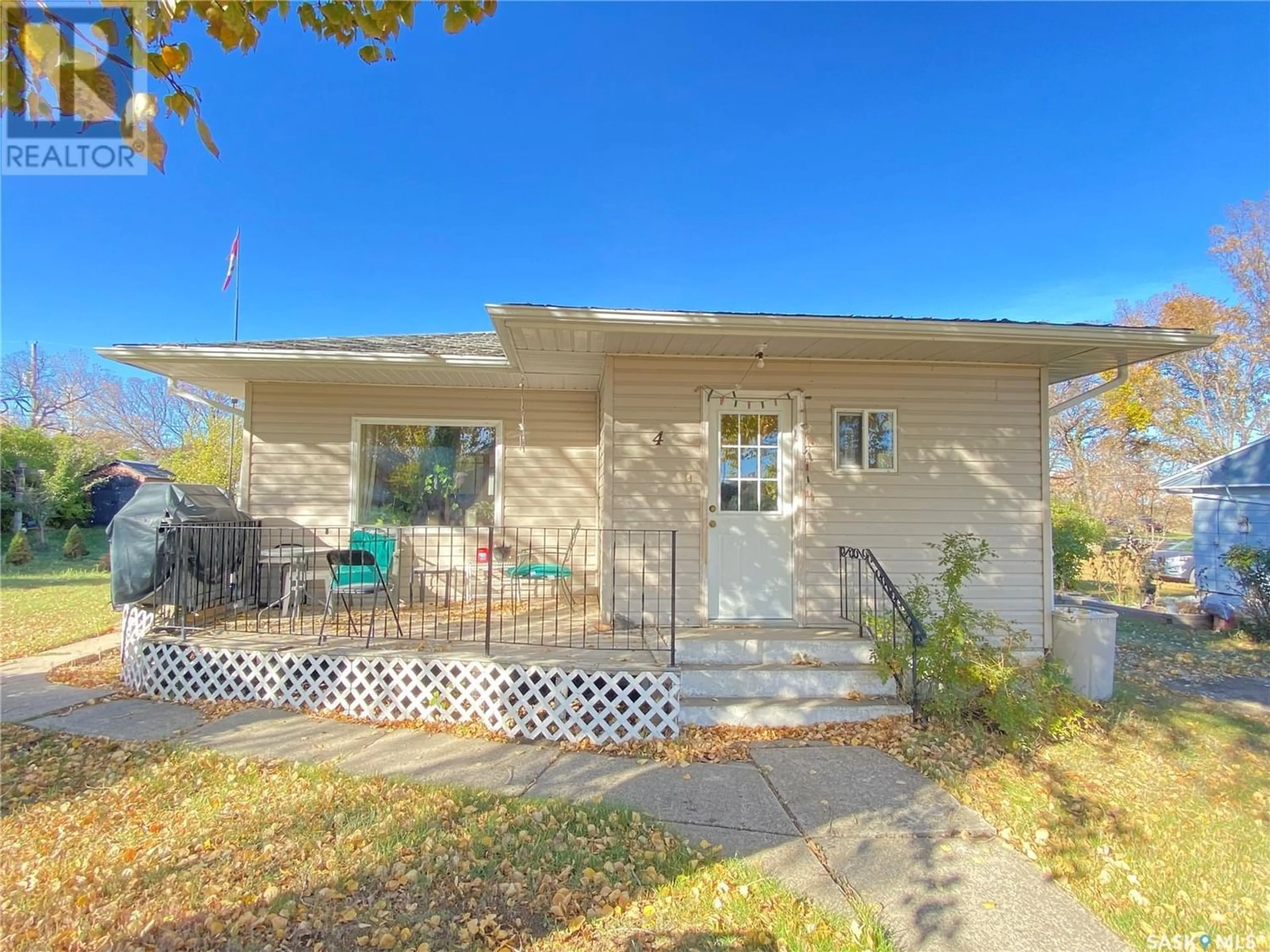 Frontside or backside of a home for 4 1st STREET, Tompkins Saskatchewan S0N2S0