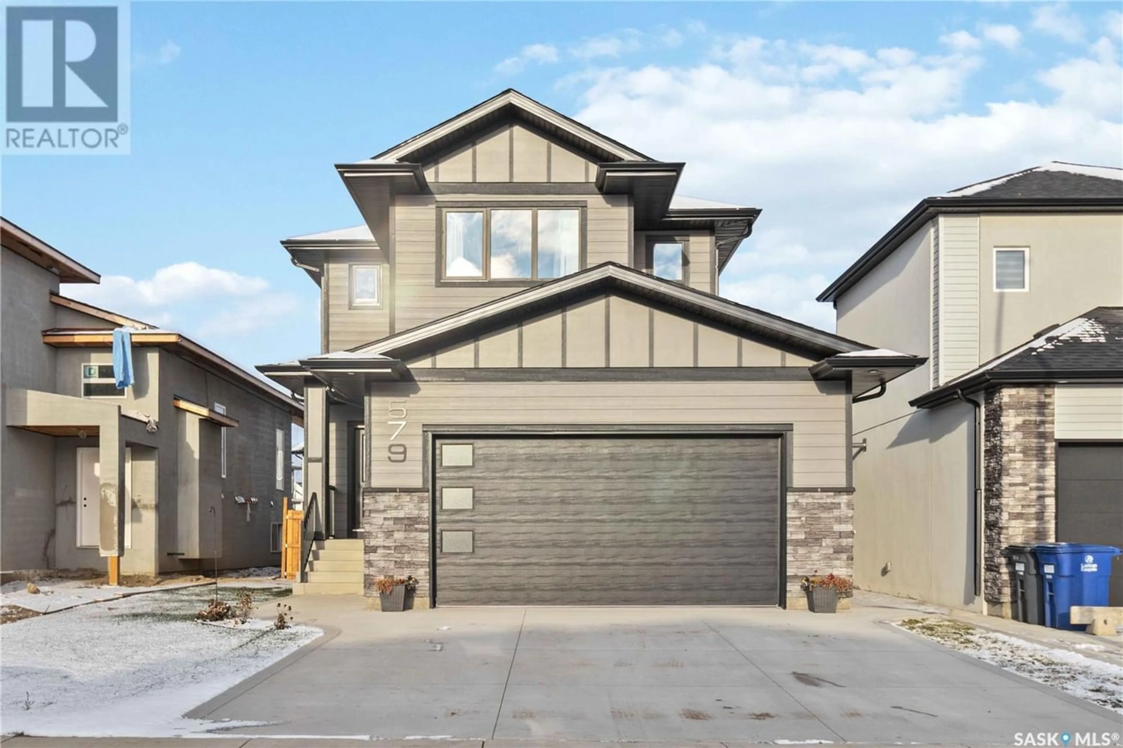 Frontside or backside of a home for 579 Kalra STREET, Saskatoon Saskatchewan S7W1E7