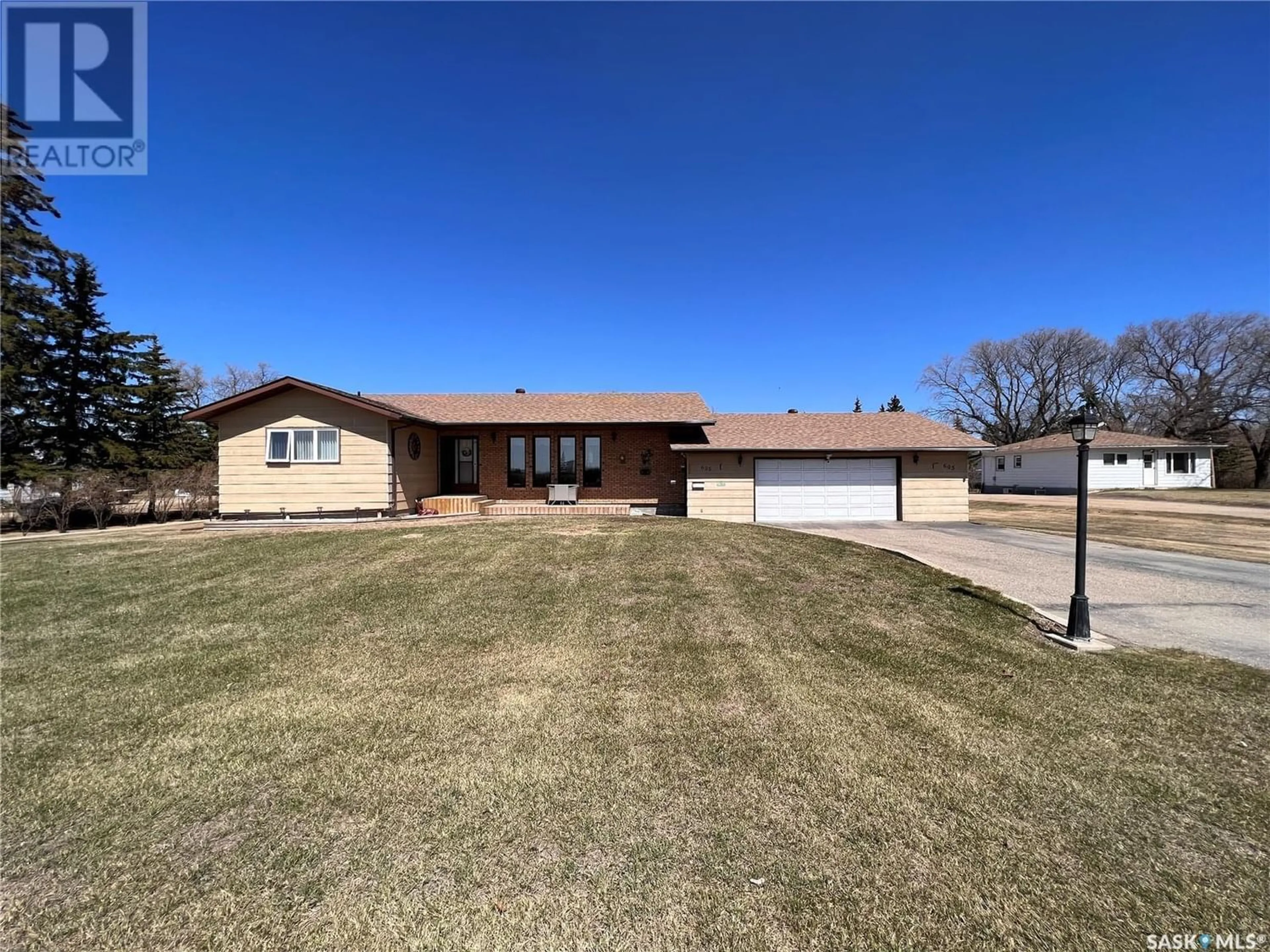 Frontside or backside of a home for 605 1st AVENUE, Raymore Saskatchewan S0A3J0