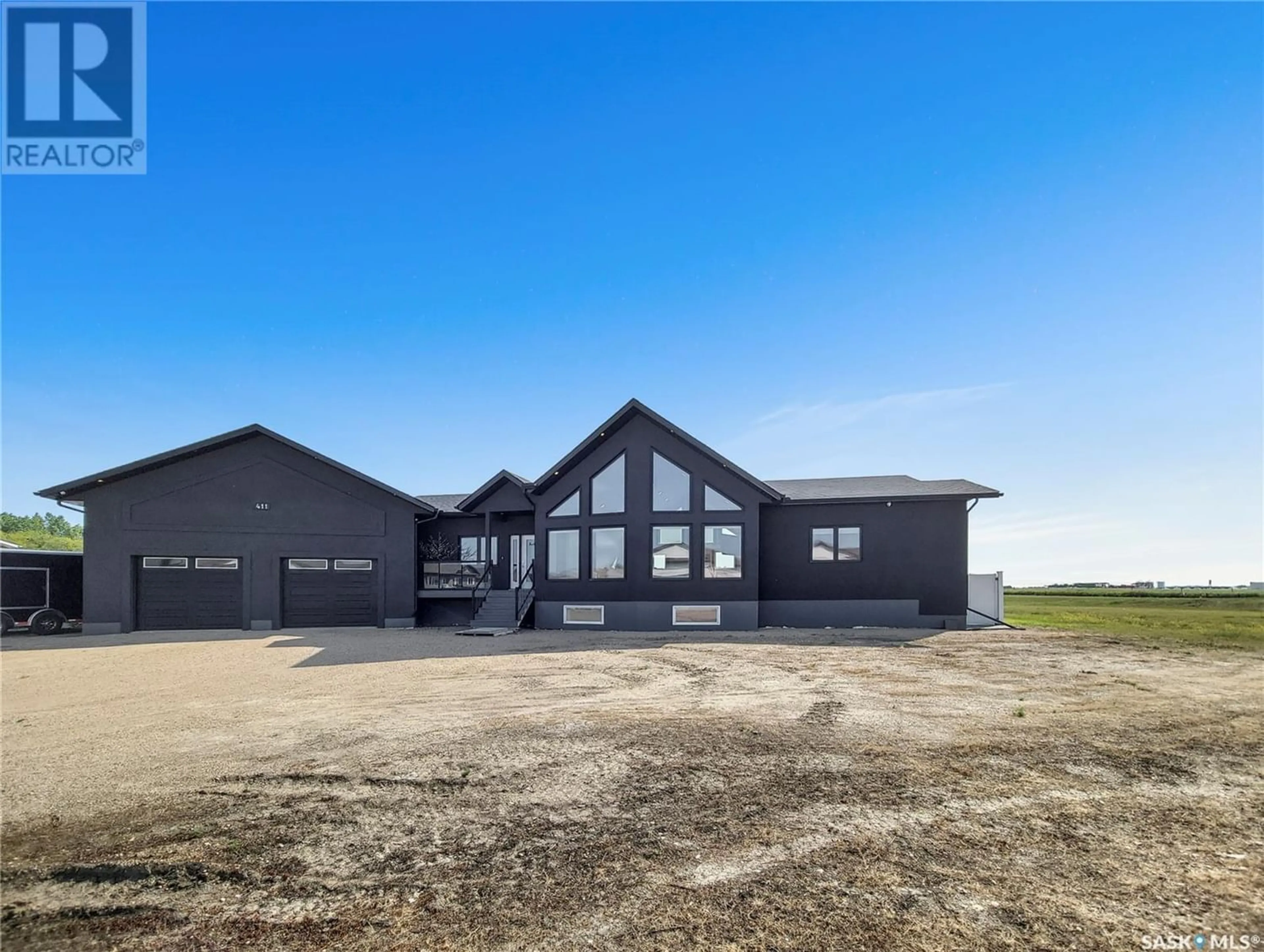 Frontside or backside of a home for 411 6th AVENUE W, Watrous Saskatchewan S0K4T0