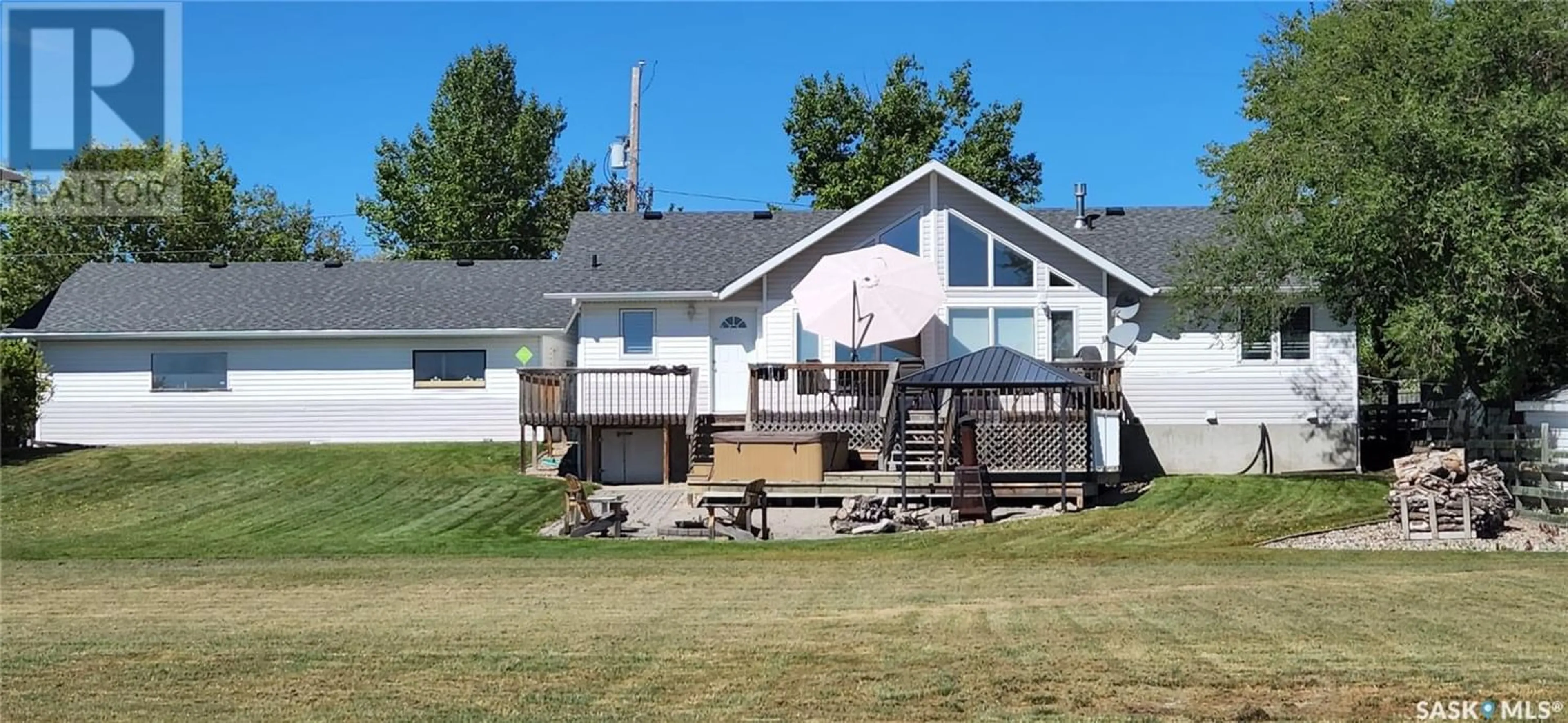 Frontside or backside of a home for 702 Aqualane AVENUE, Aquadeo Saskatchewan S0M1E0