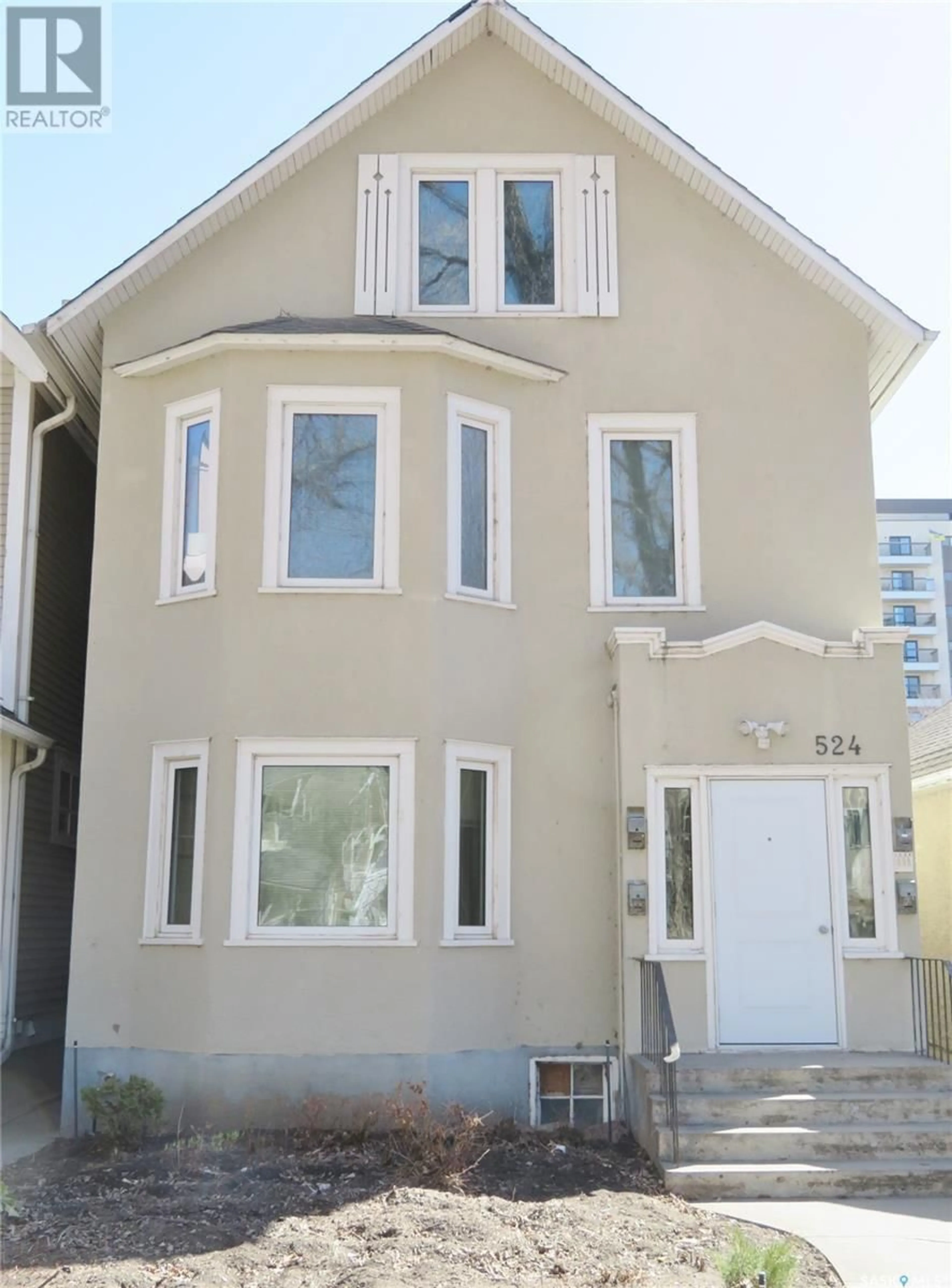 Frontside or backside of a home for 524 4th AVENUE N, Saskatoon Saskatchewan S7K2M7