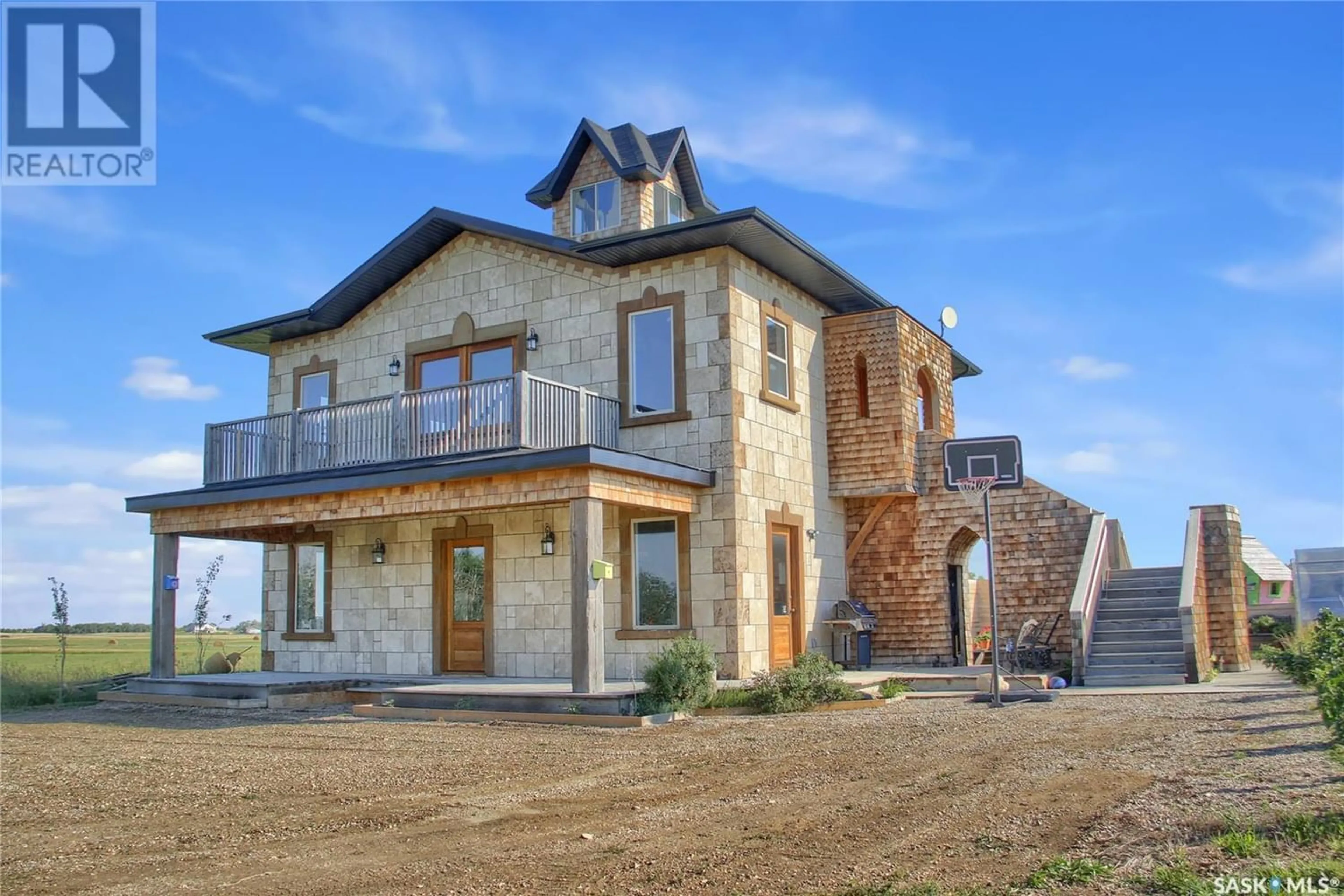 Home with stone exterior material for Valley View Estates Acreage, Craven Saskatchewan S0G0W0