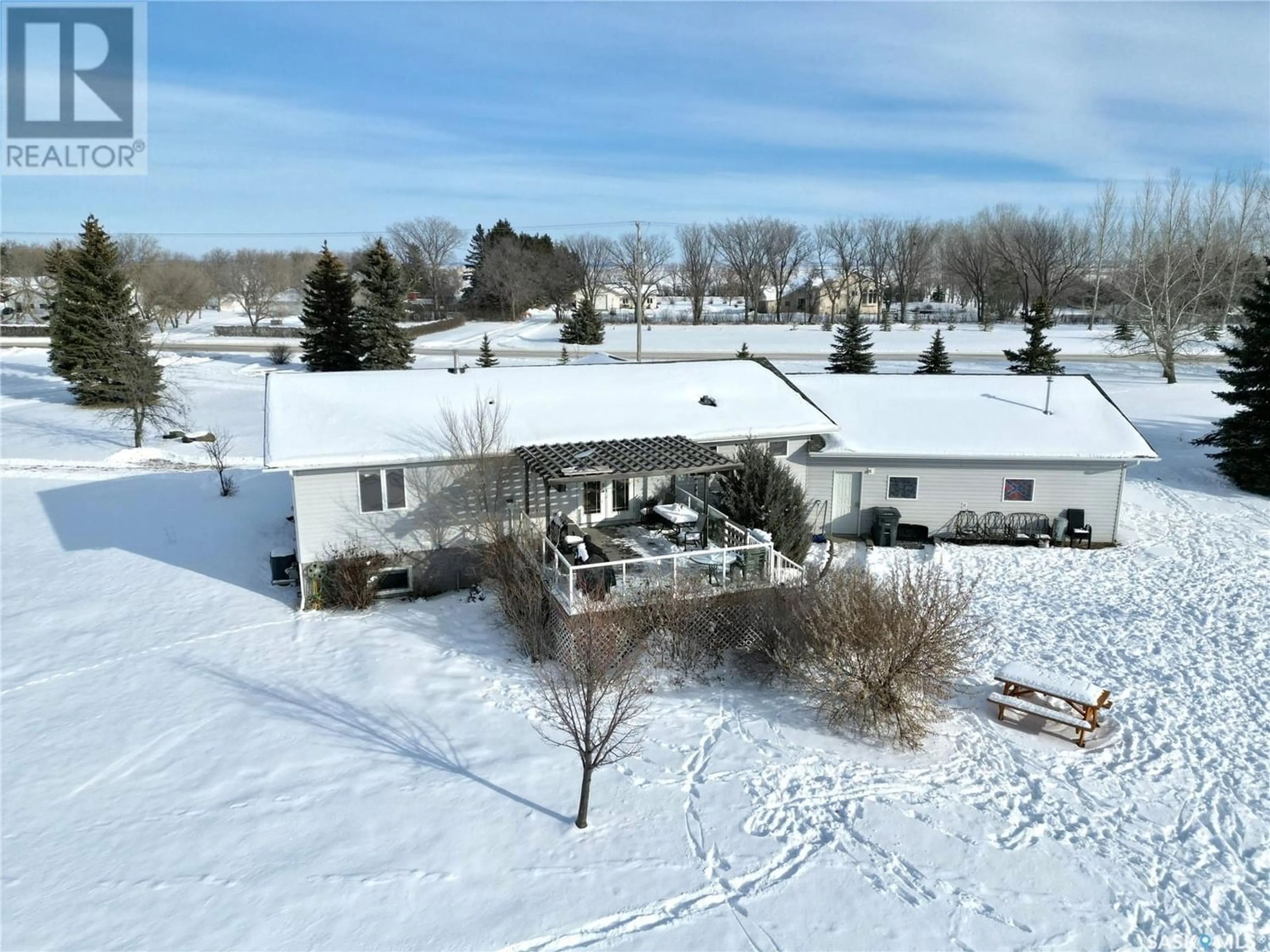 A pic from exterior of the house or condo, the fenced backyard for 800 McKenzie STREET N, Outlook Saskatchewan S0L2N0