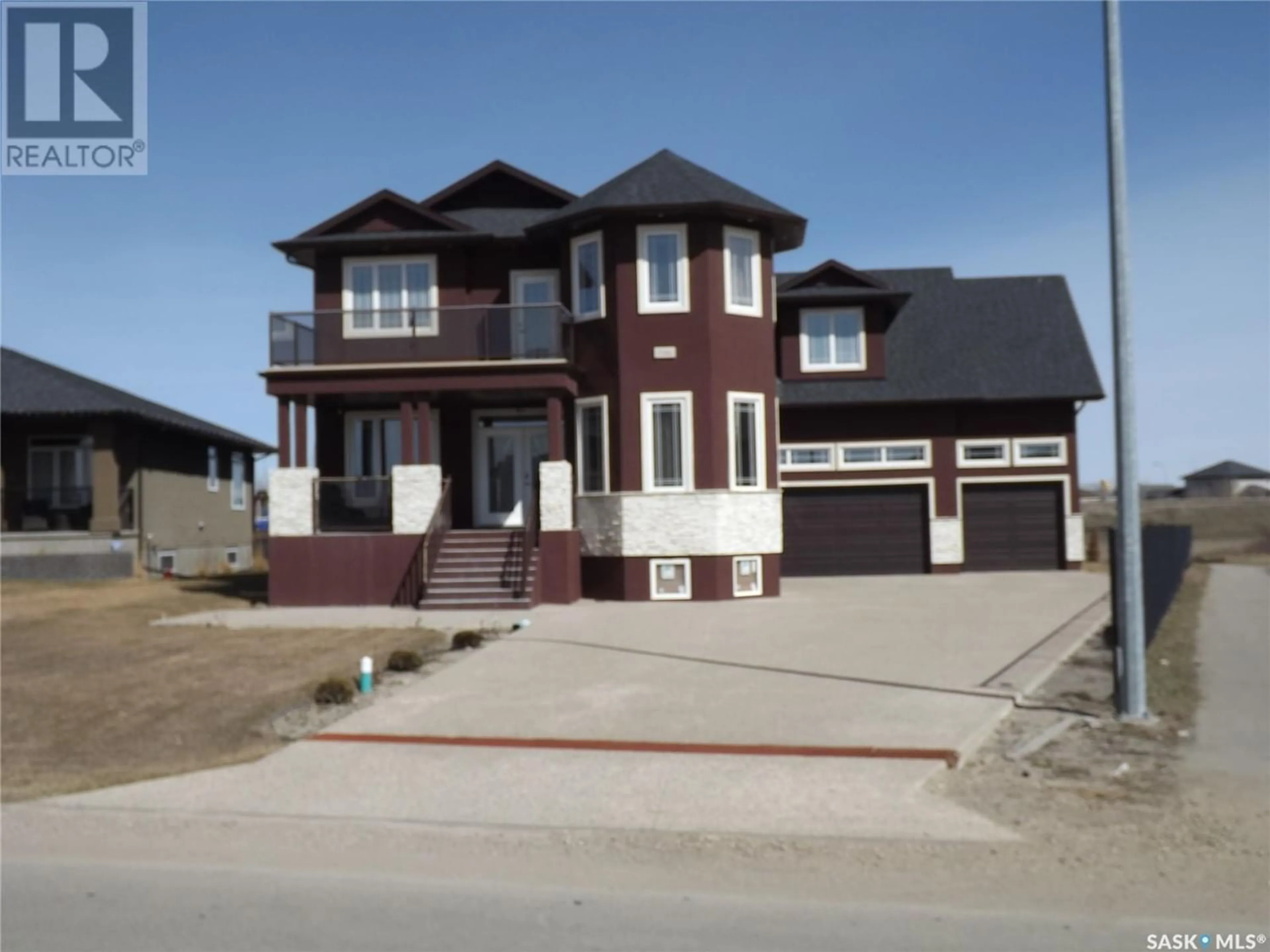 Home with stucco exterior material for 116 Emerald RIDGE E, White City Saskatchewan S4L0C1