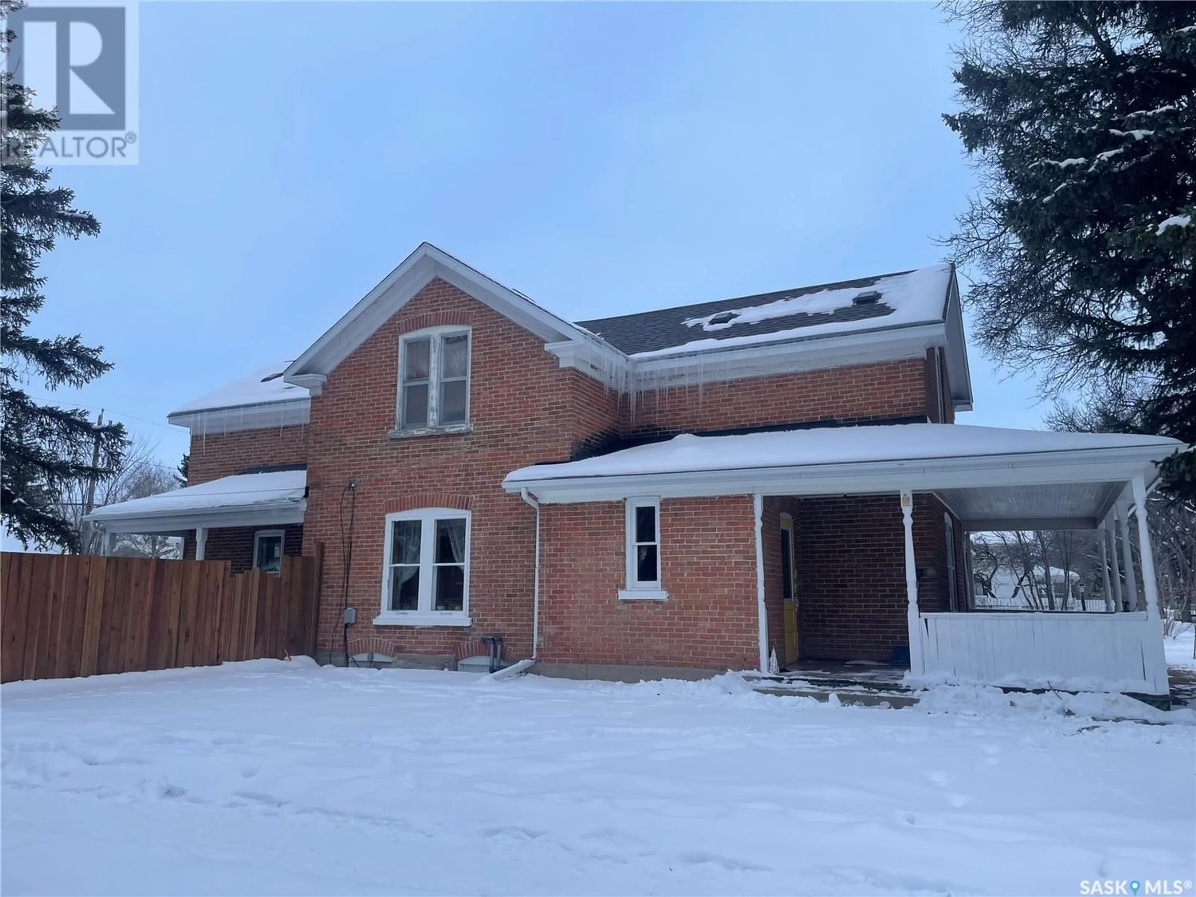 Home with brick exterior material for 402 Jasper STREET, Maple Creek Saskatchewan S0N1N0