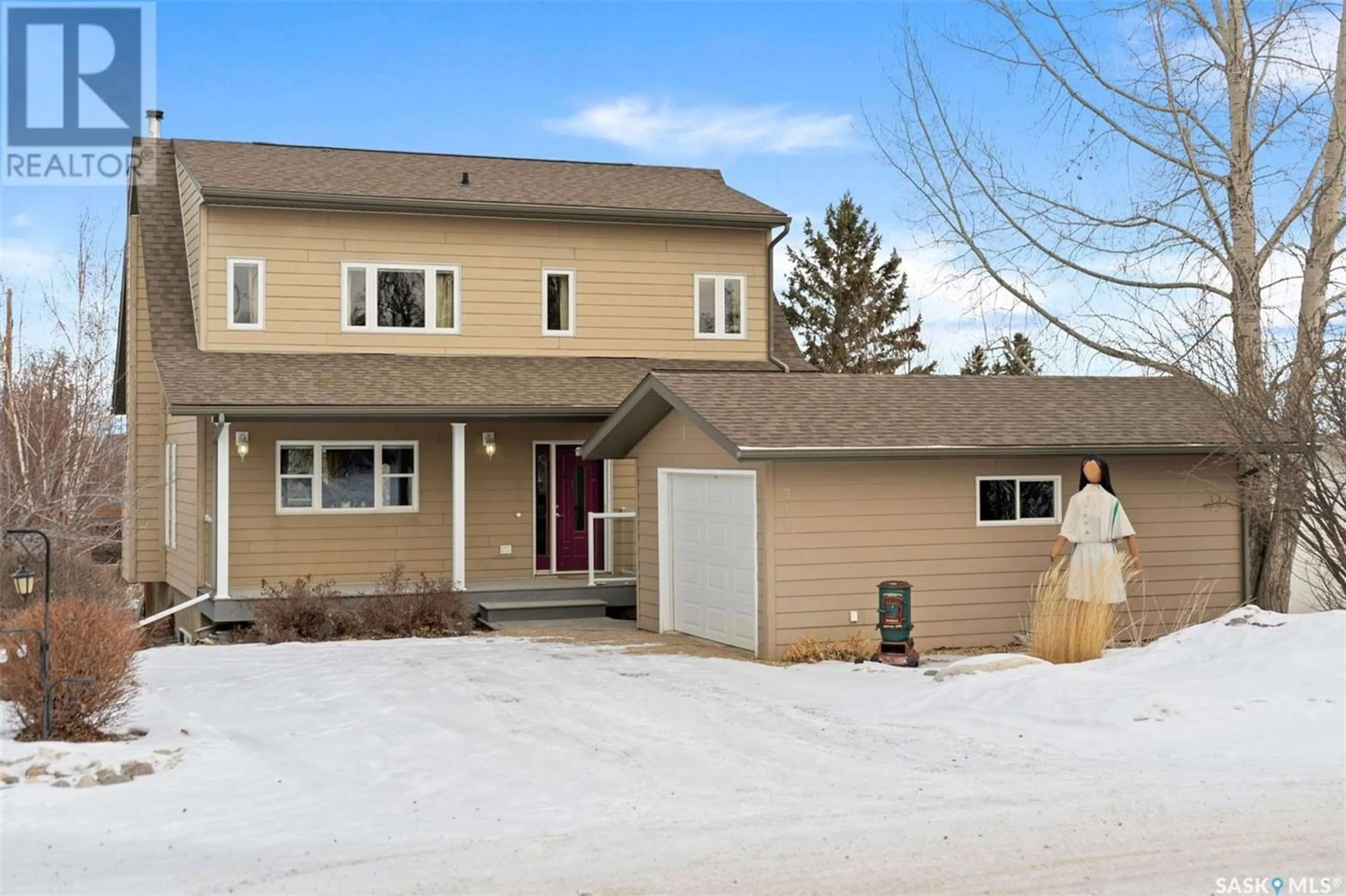 Frontside or backside of a home for 317 Cumming AVENUE, Manitou Beach Saskatchewan S0K4T1