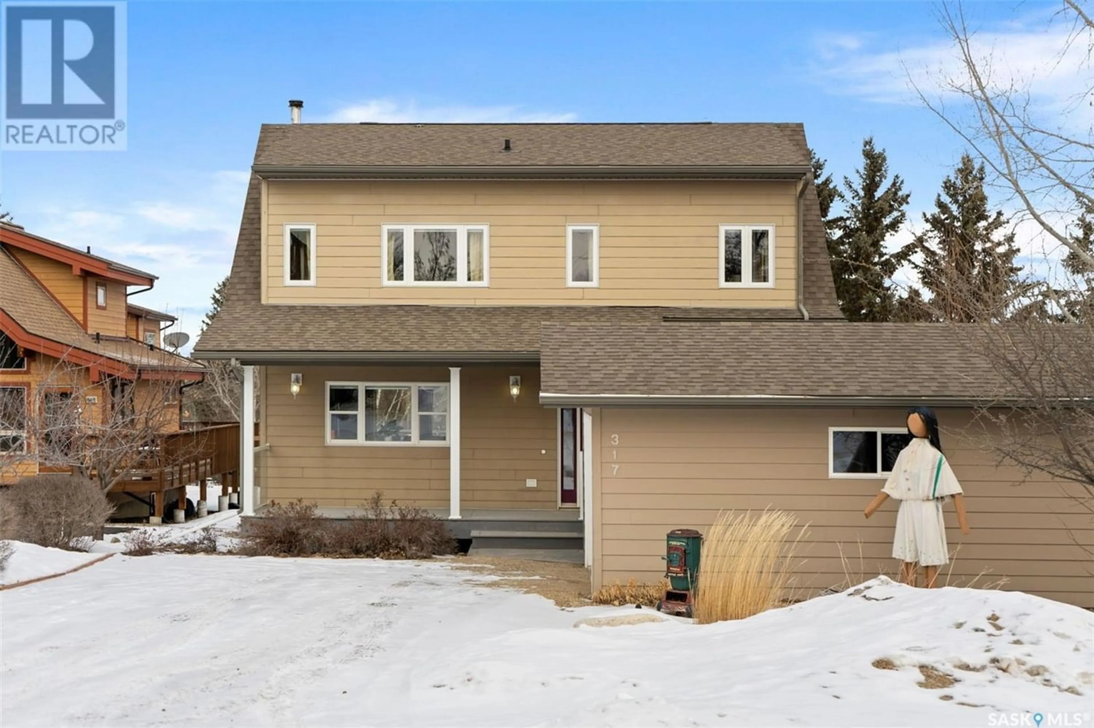 Frontside or backside of a home for 317 Cumming AVENUE, Manitou Beach Saskatchewan S0K4T1