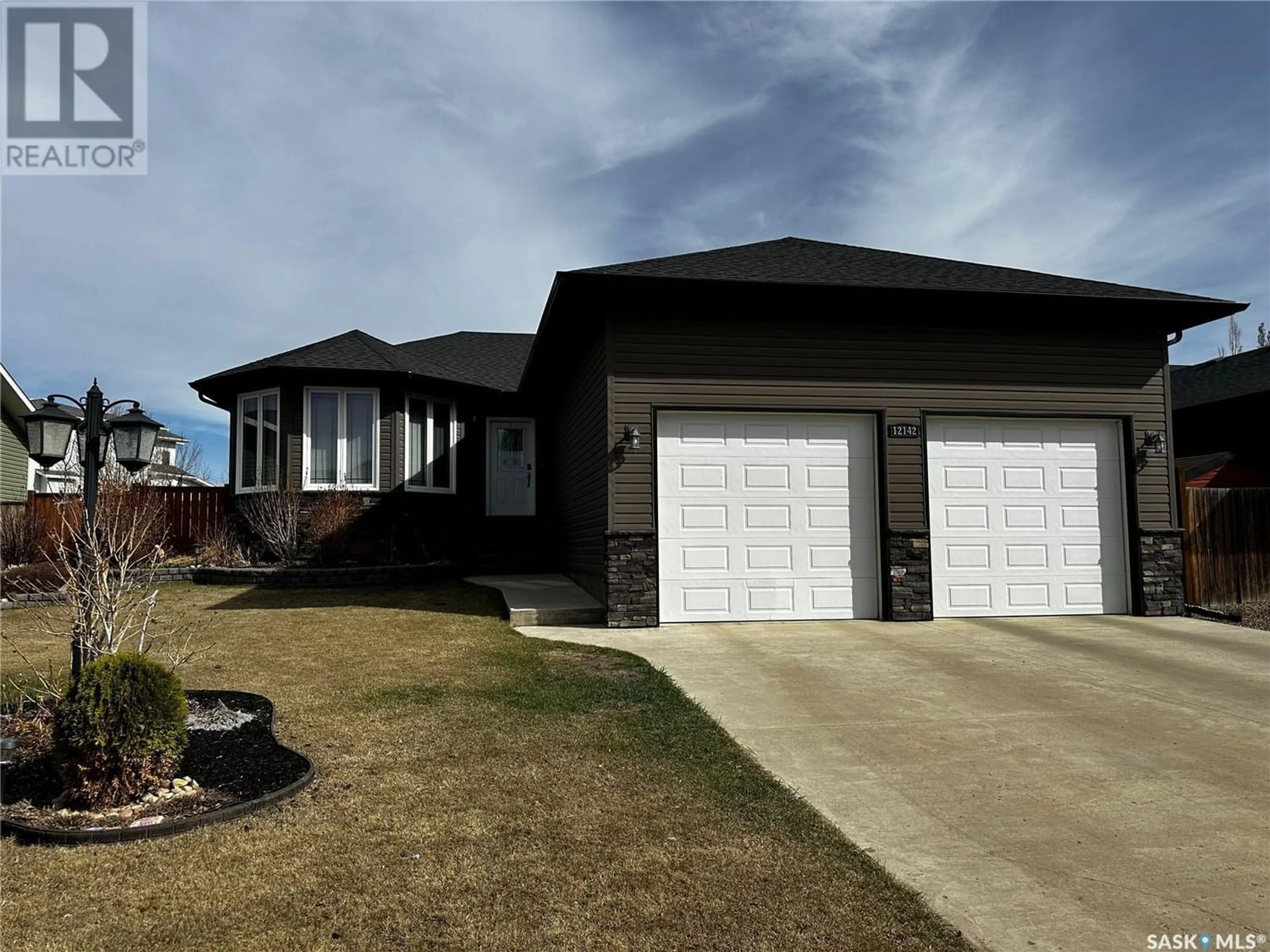 Home with stucco exterior material for 12142 Battle Springs DRIVE, Battleford Saskatchewan S0M0E0