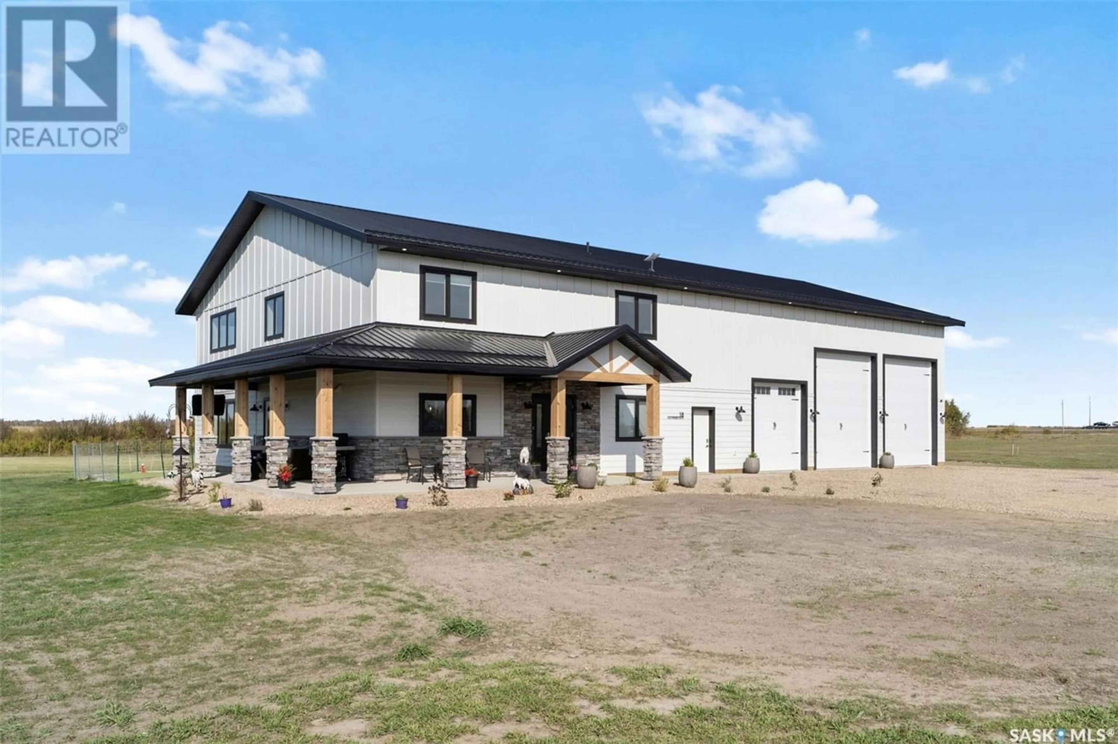 Home with stucco exterior material for 18 Elkwood ESTATES, Dundurn Rm No. 314 Saskatchewan S0K0C5