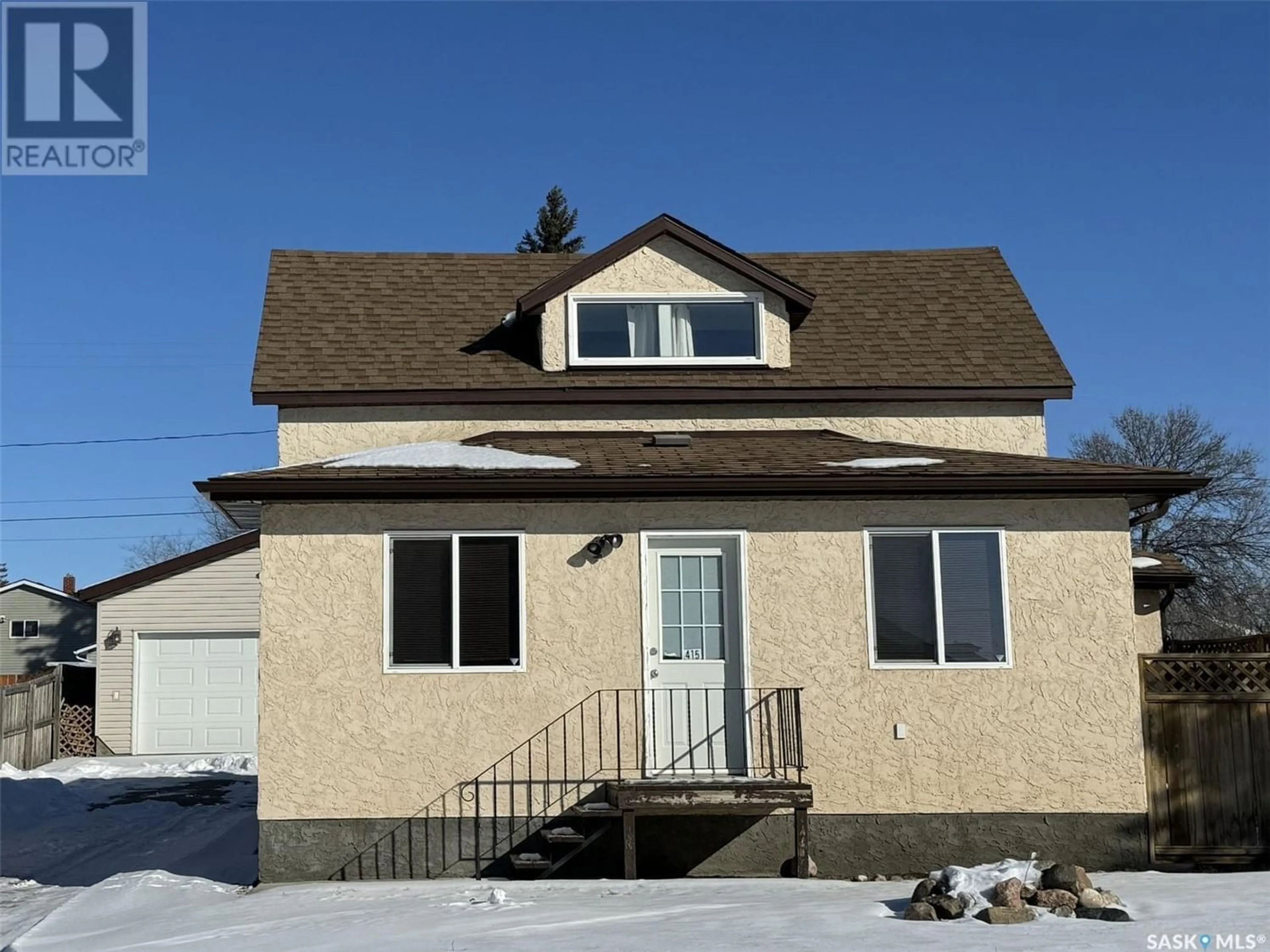 Frontside or backside of a home for 415 2nd AVENUE E, Biggar Saskatchewan S0K0M0