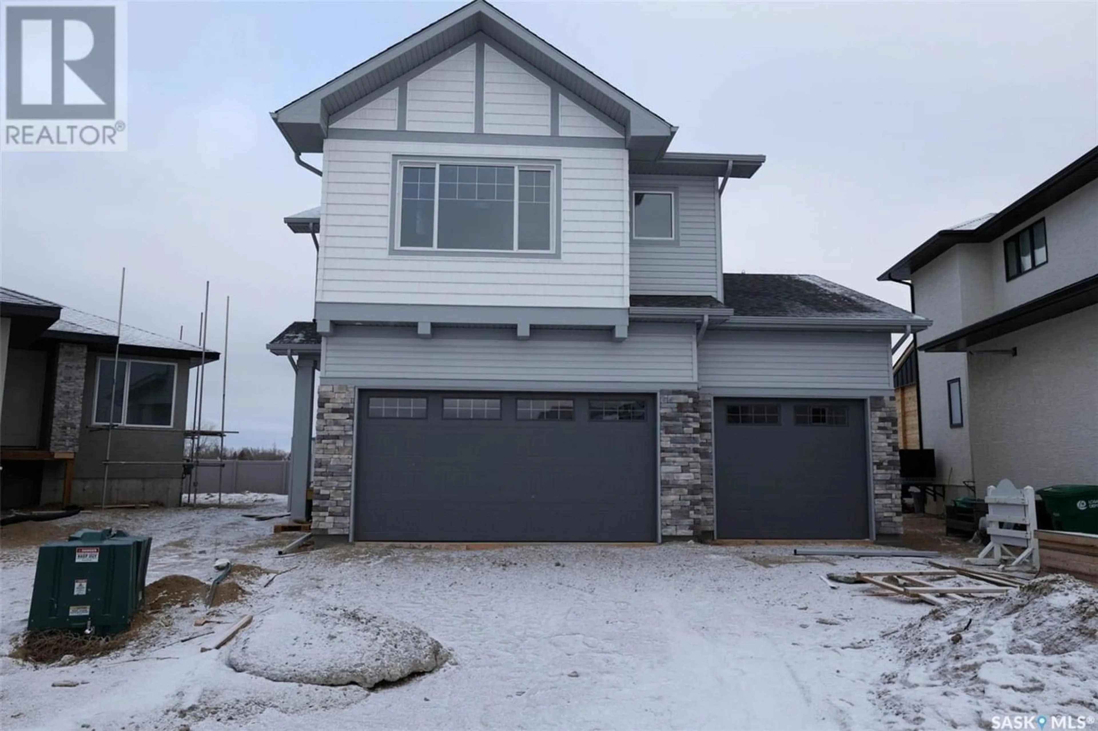 Home with stucco exterior material for 34 Mackenzie CRESCENT, Pilot Butte Saskatchewan S0G3Z0