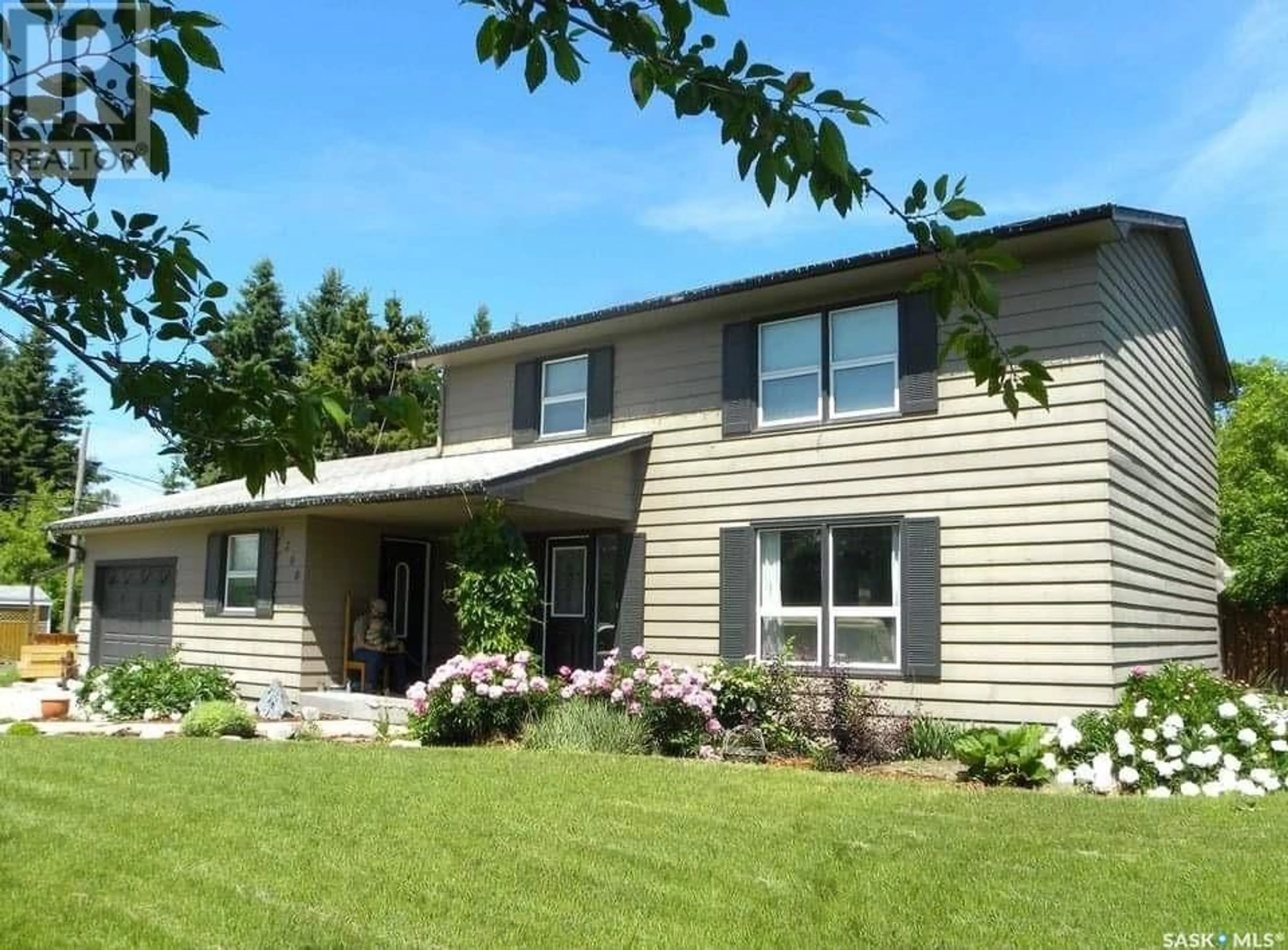 Home with vinyl exterior material for 1208 11th AVENUE, Humboldt Saskatchewan S0K2A0