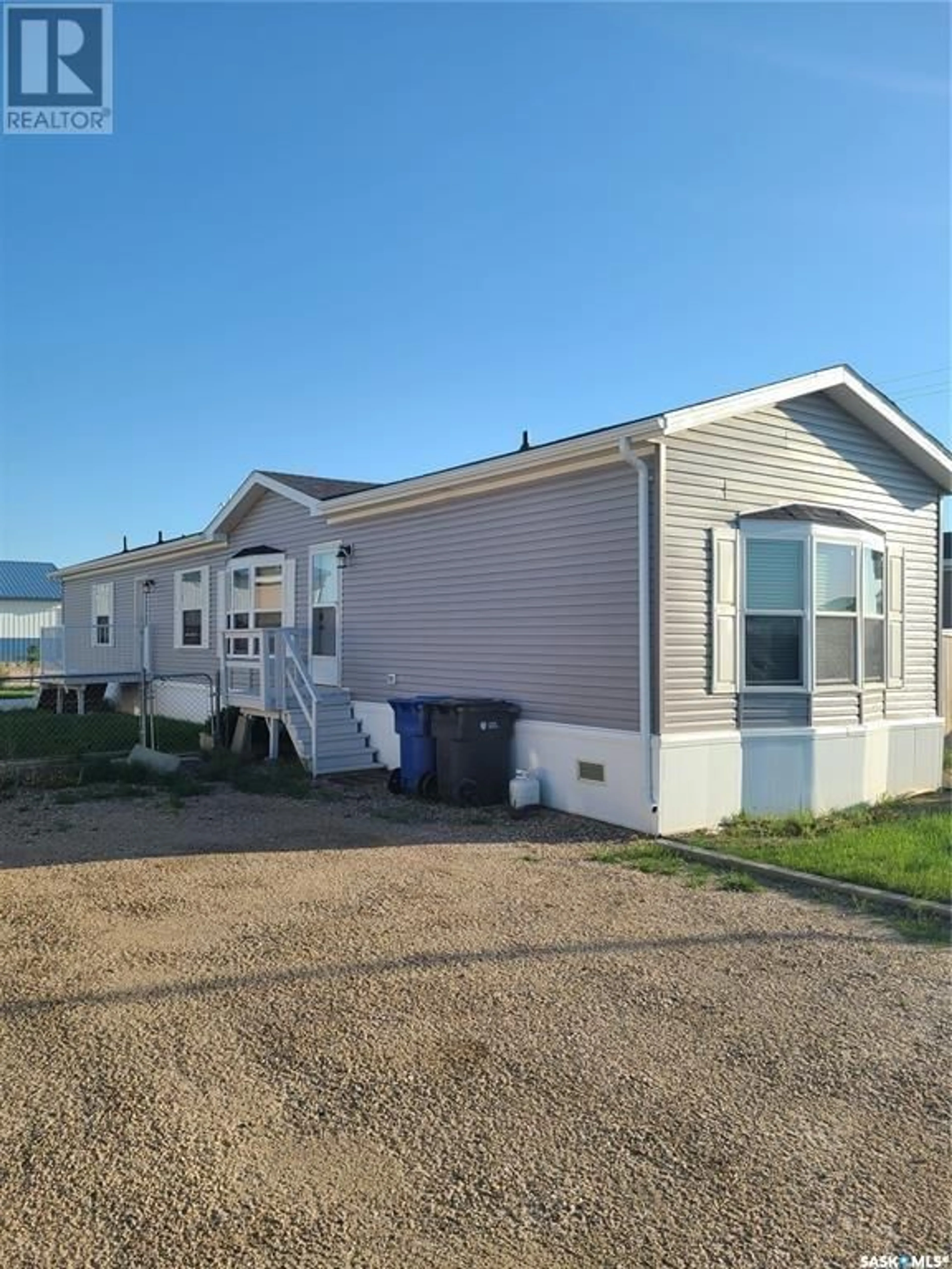 Home with vinyl exterior material for 503 Stockton AVENUE, Carlyle Saskatchewan S0C0R0