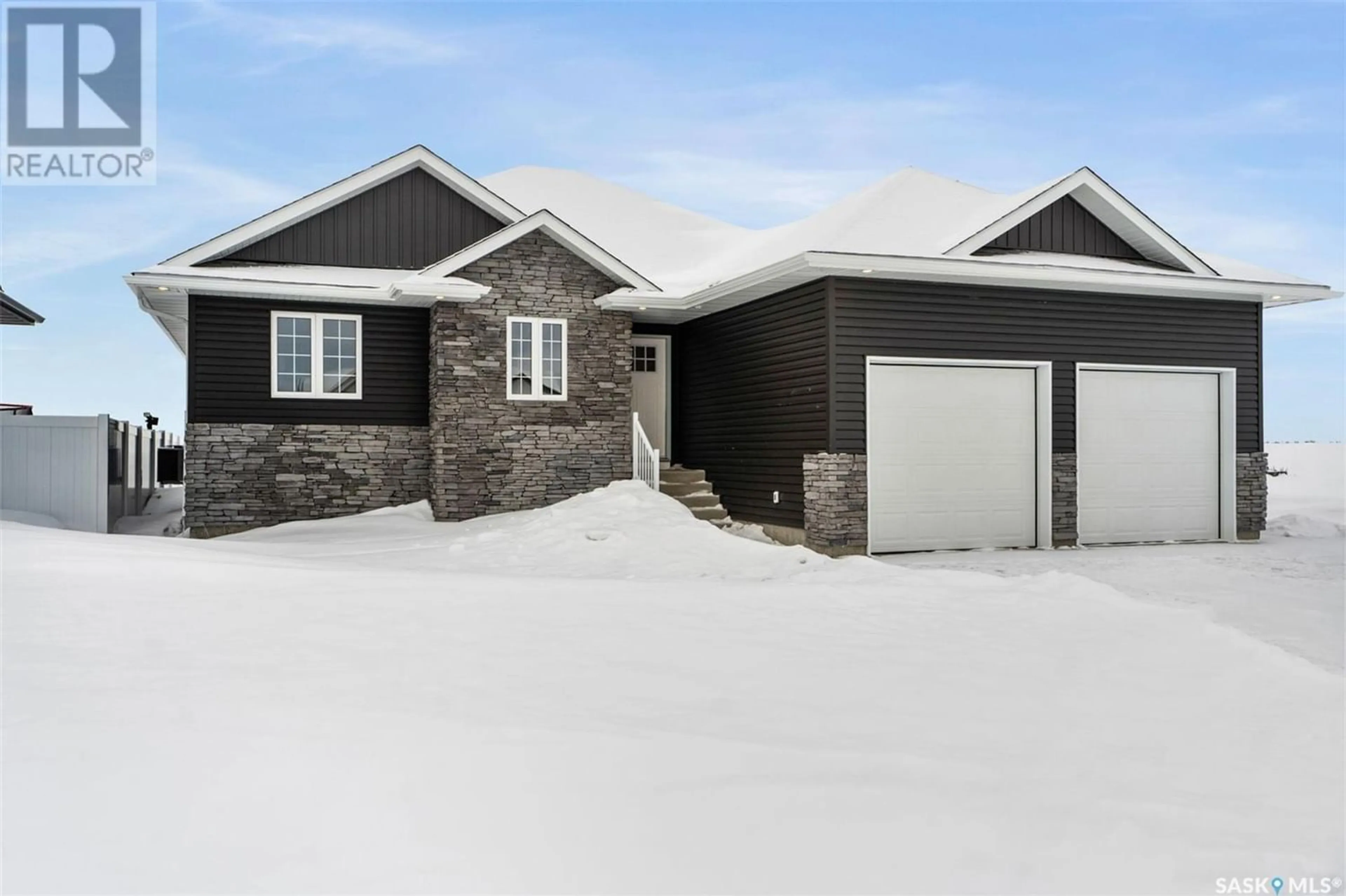 Home with stucco exterior material for 94 Diefenbaker AVENUE, Hague Saskatchewan S0K1X0