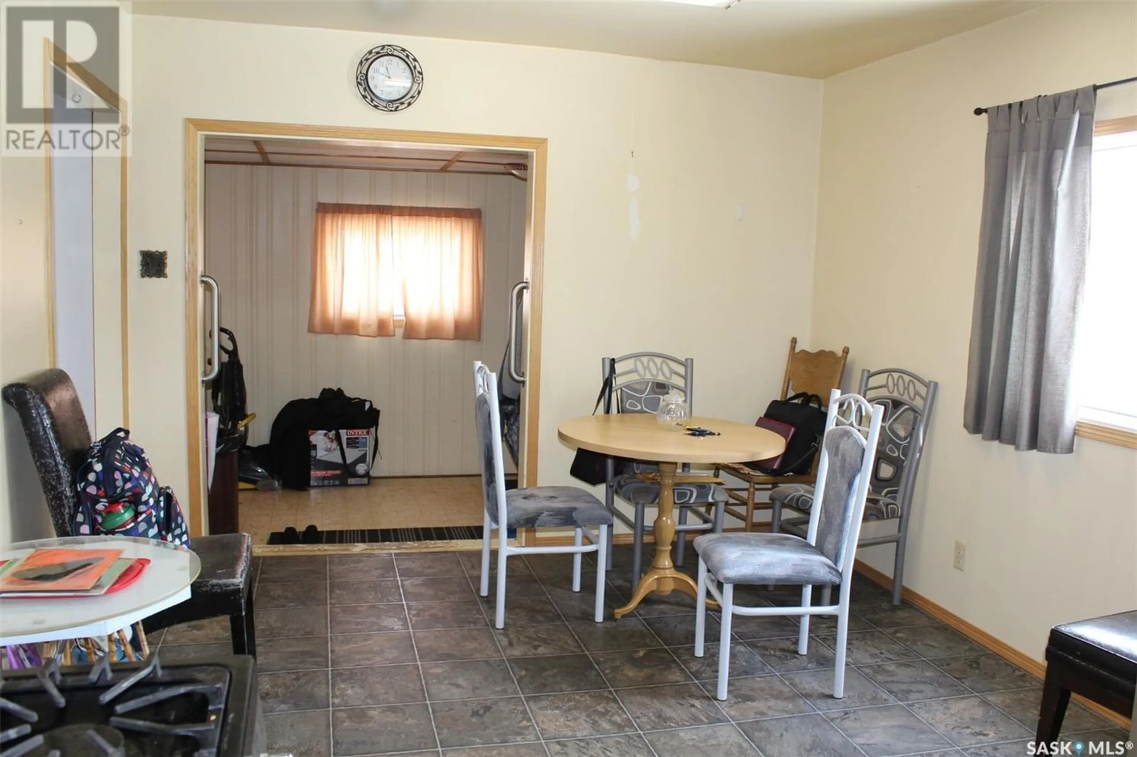 Dining room, floor is not visible for 903 4th STREET S, Weyburn Saskatchewan S4H2G6