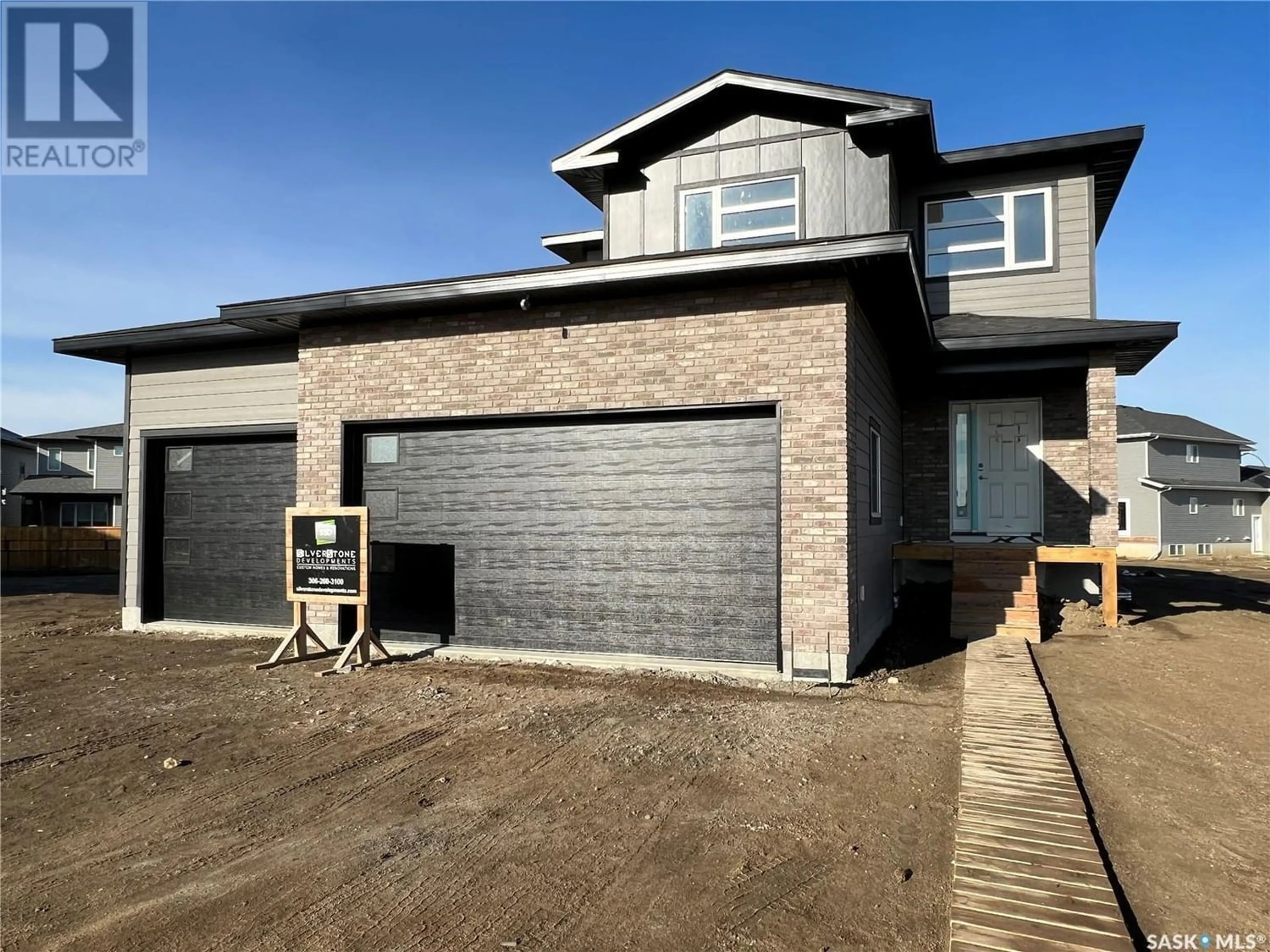 Home with brick exterior material for 184 Haverstock CRESCENT, Saskatoon Saskatchewan S7W0Z6
