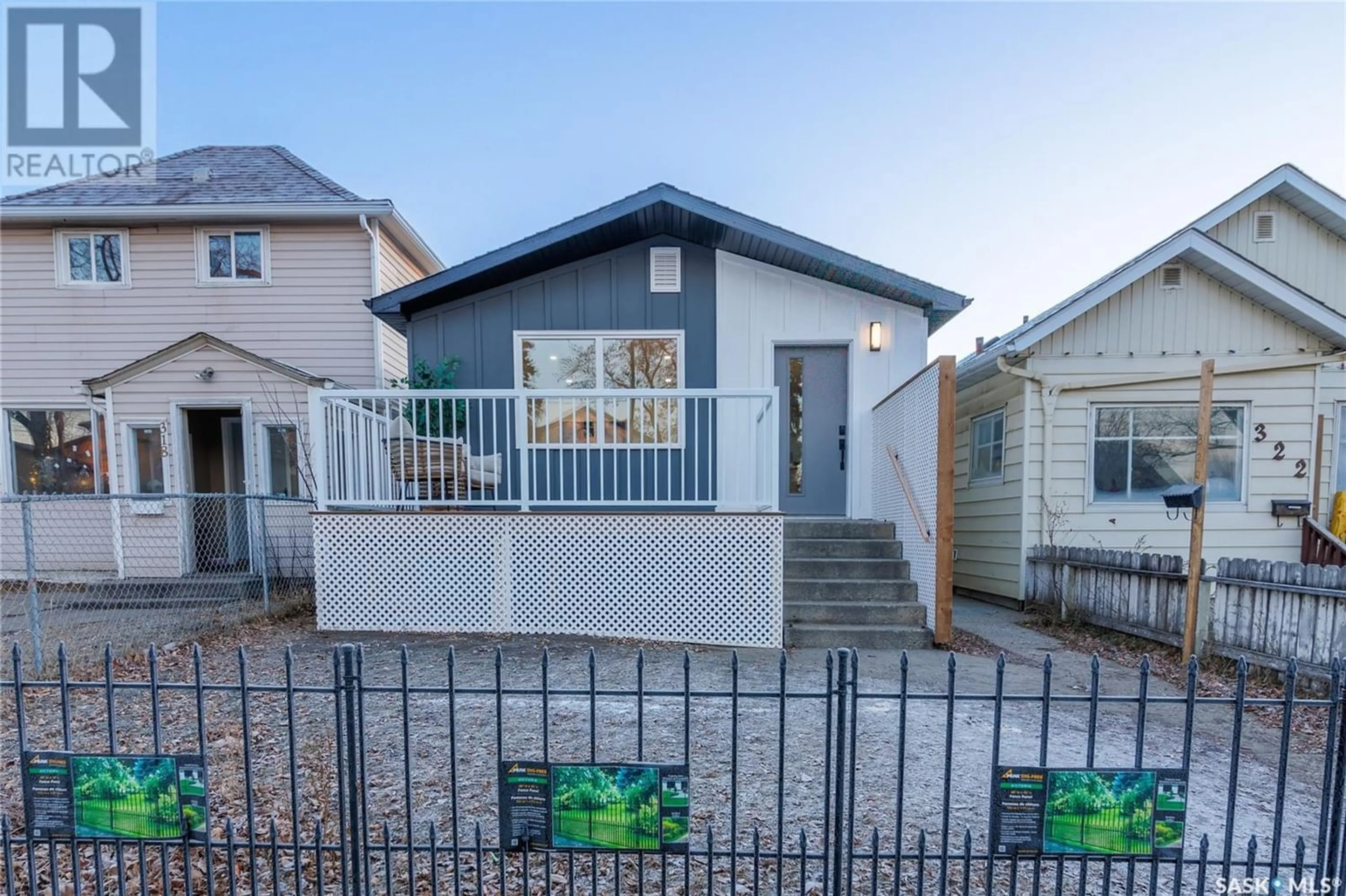 Frontside or backside of a home for 320 H AVENUE S, Saskatoon Saskatchewan S7M1W3