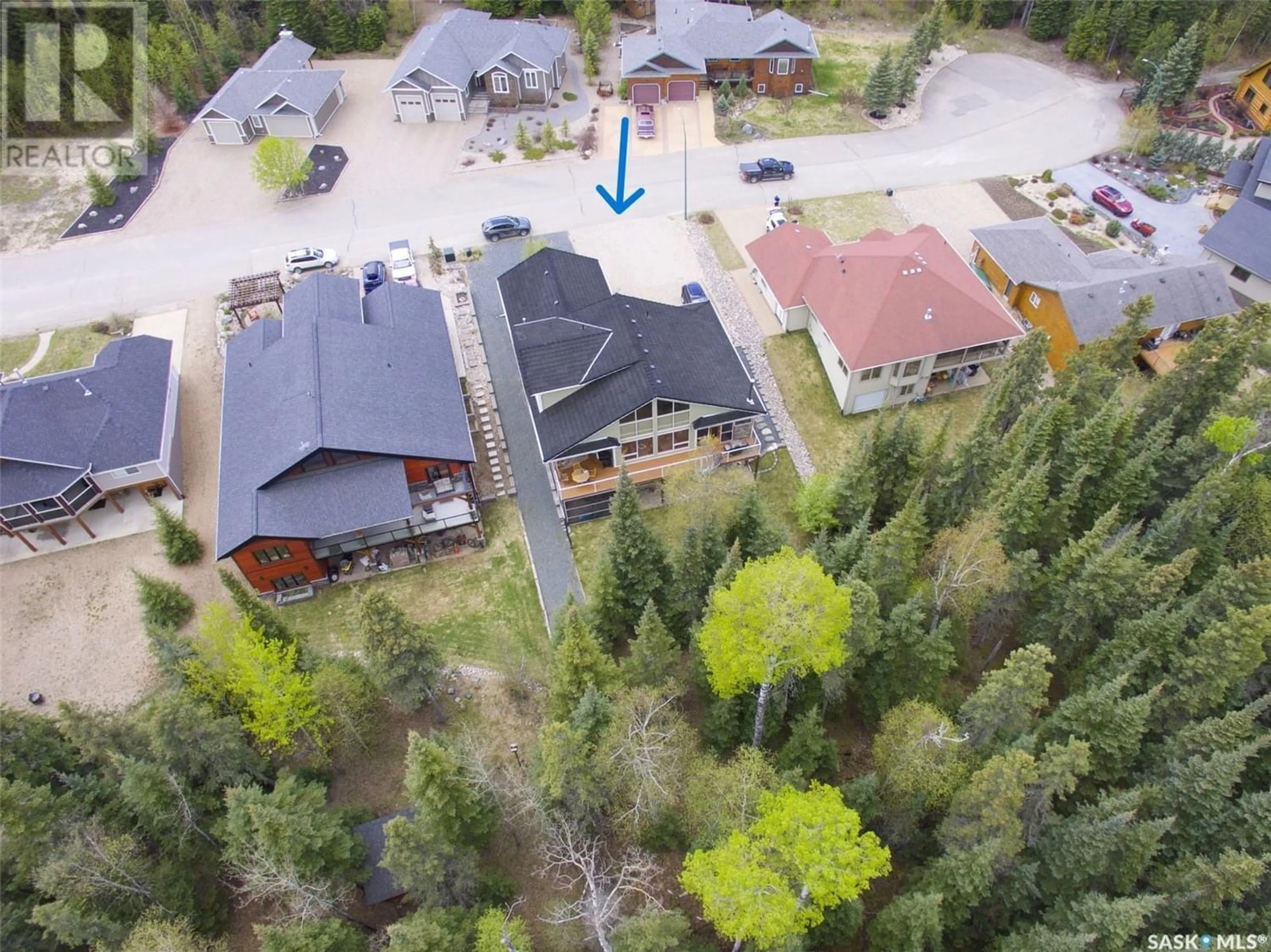 A pic from outside/outdoor area/front of a property/back of a property/a pic from drone, forest/trees view for Elk Ridge Estates, Elk Ridge Saskatchewan S0J2Y0