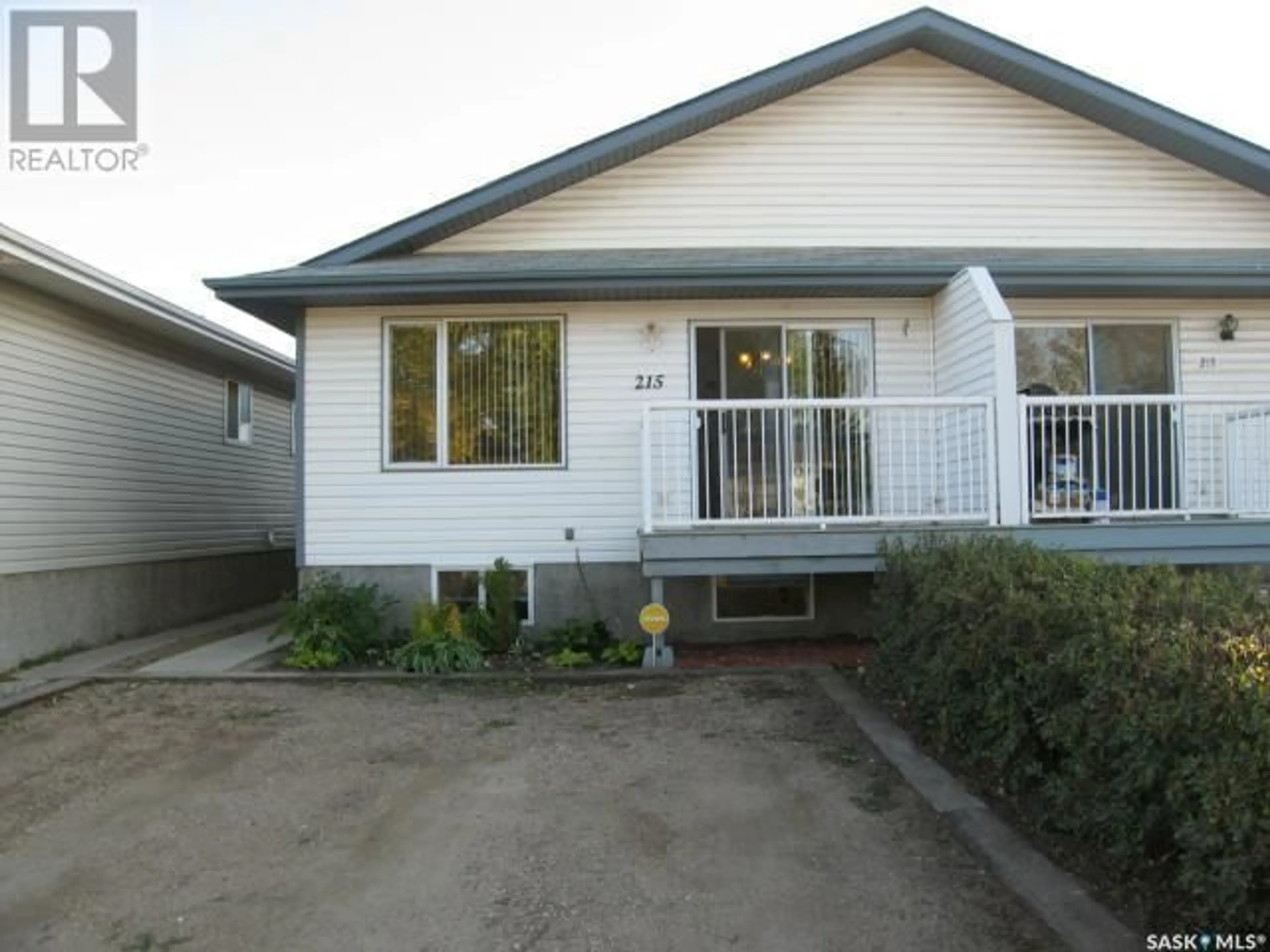 Frontside or backside of a home for 215 Haichert STREET, Warman Saskatchewan S0K4S0