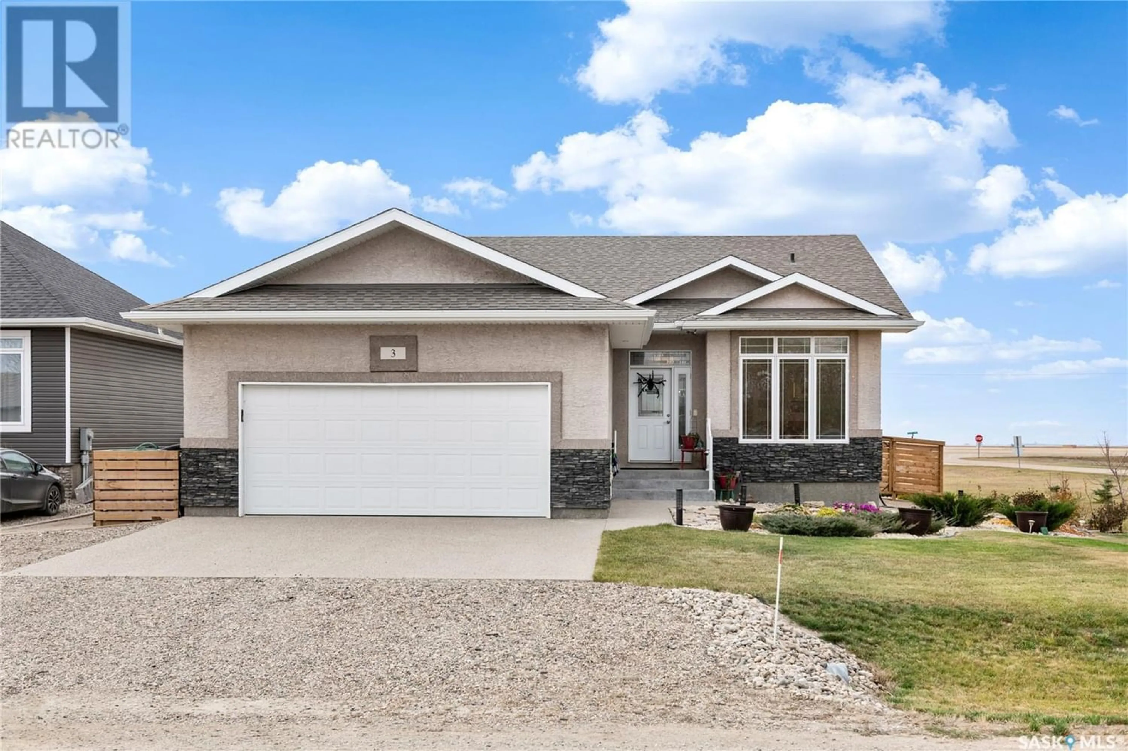 Frontside or backside of a home for 3 Matthew AVENUE, Kronau Saskatchewan S0G2T0