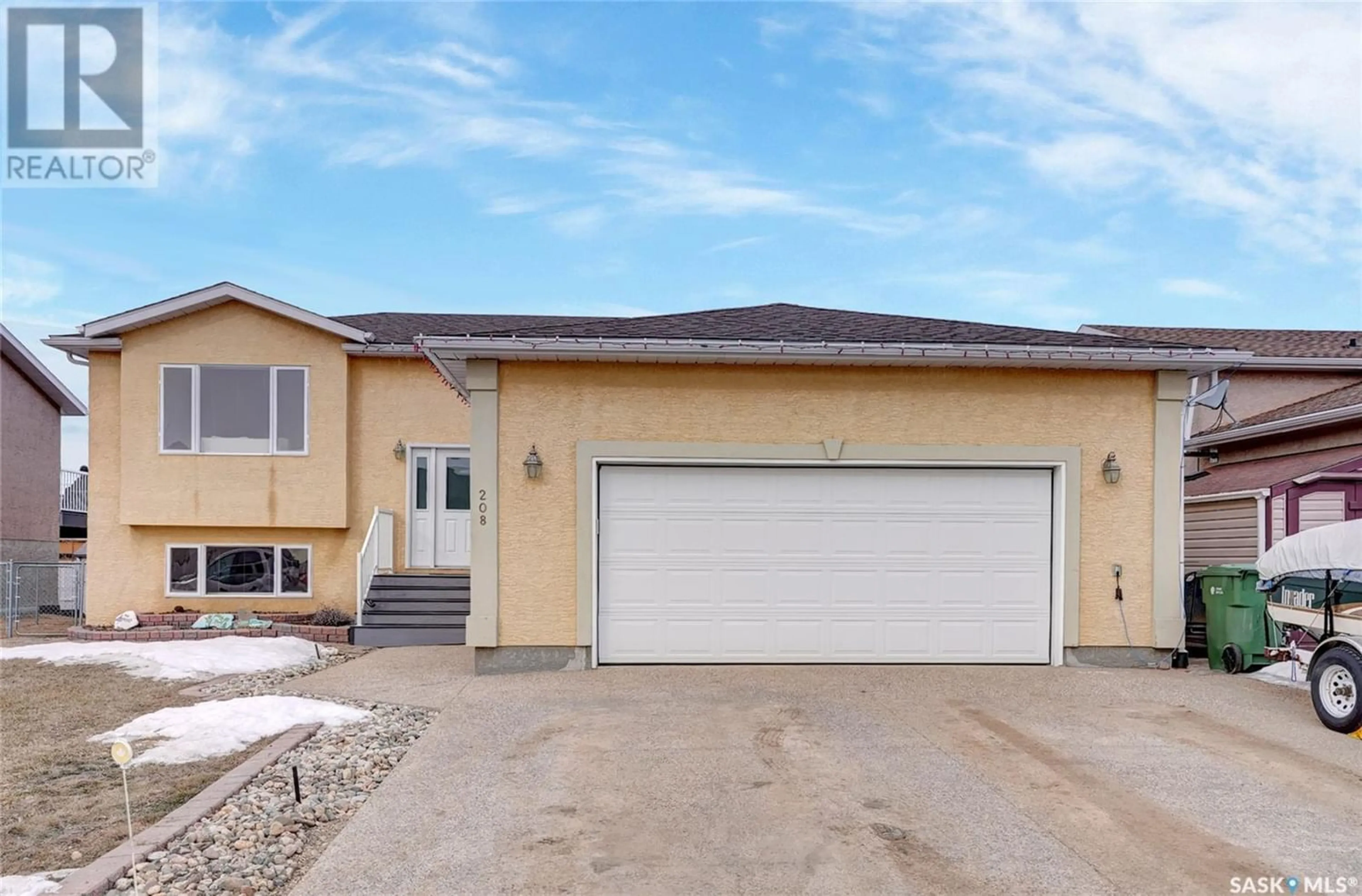 Frontside or backside of a home for 208 Willow STREET, Pense Saskatchewan S0G3W0