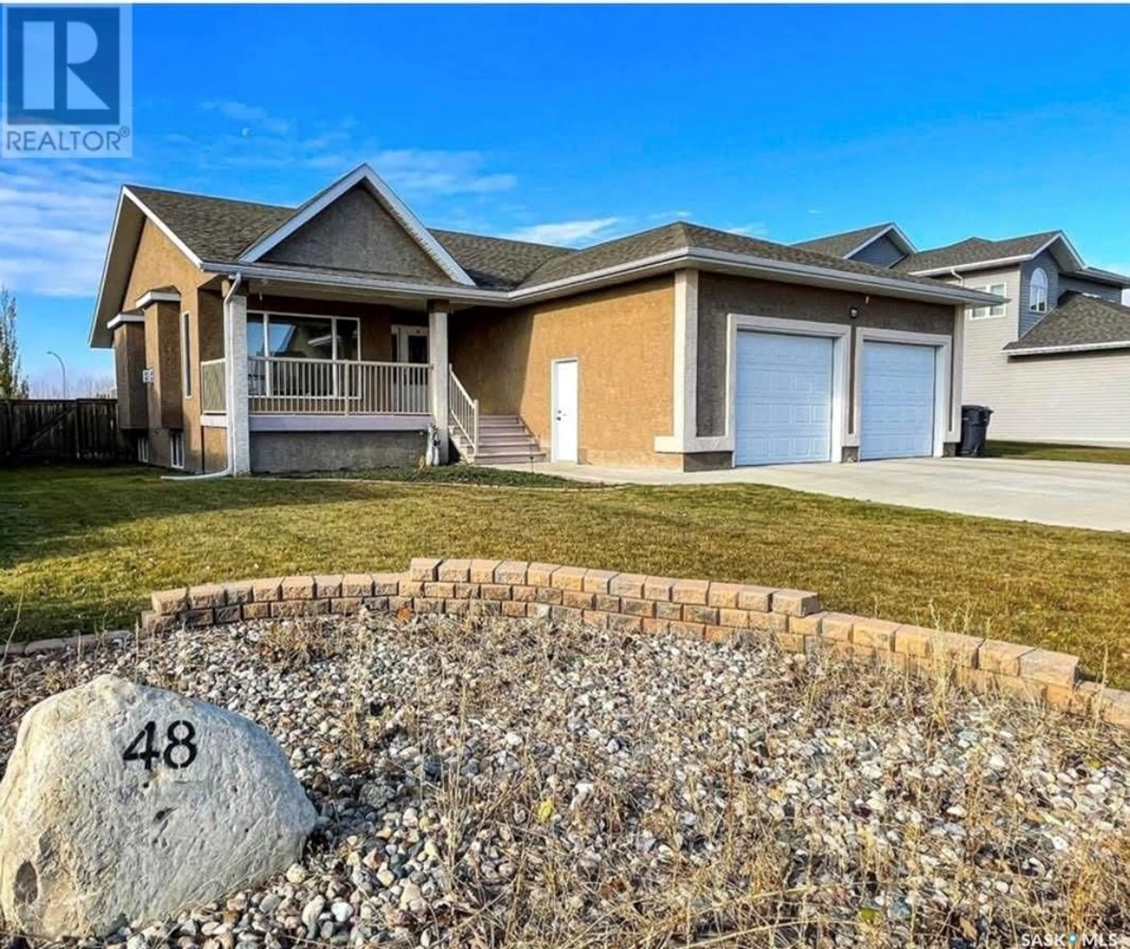 Frontside or backside of a home for 48 Gibson STREET, Meadow Lake Saskatchewan S9X1Y9