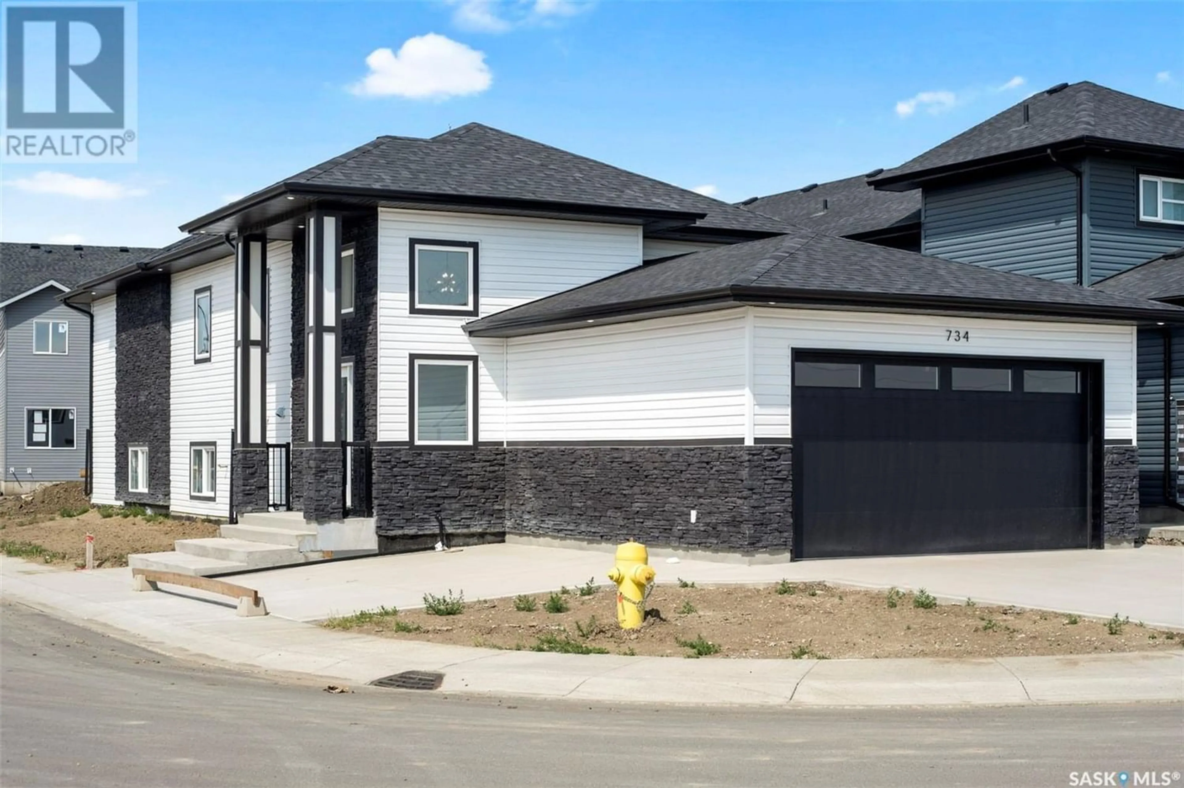 Frontside or backside of a home for 734 Delainey COURT, Saskatoon Saskatchewan S7W0T2