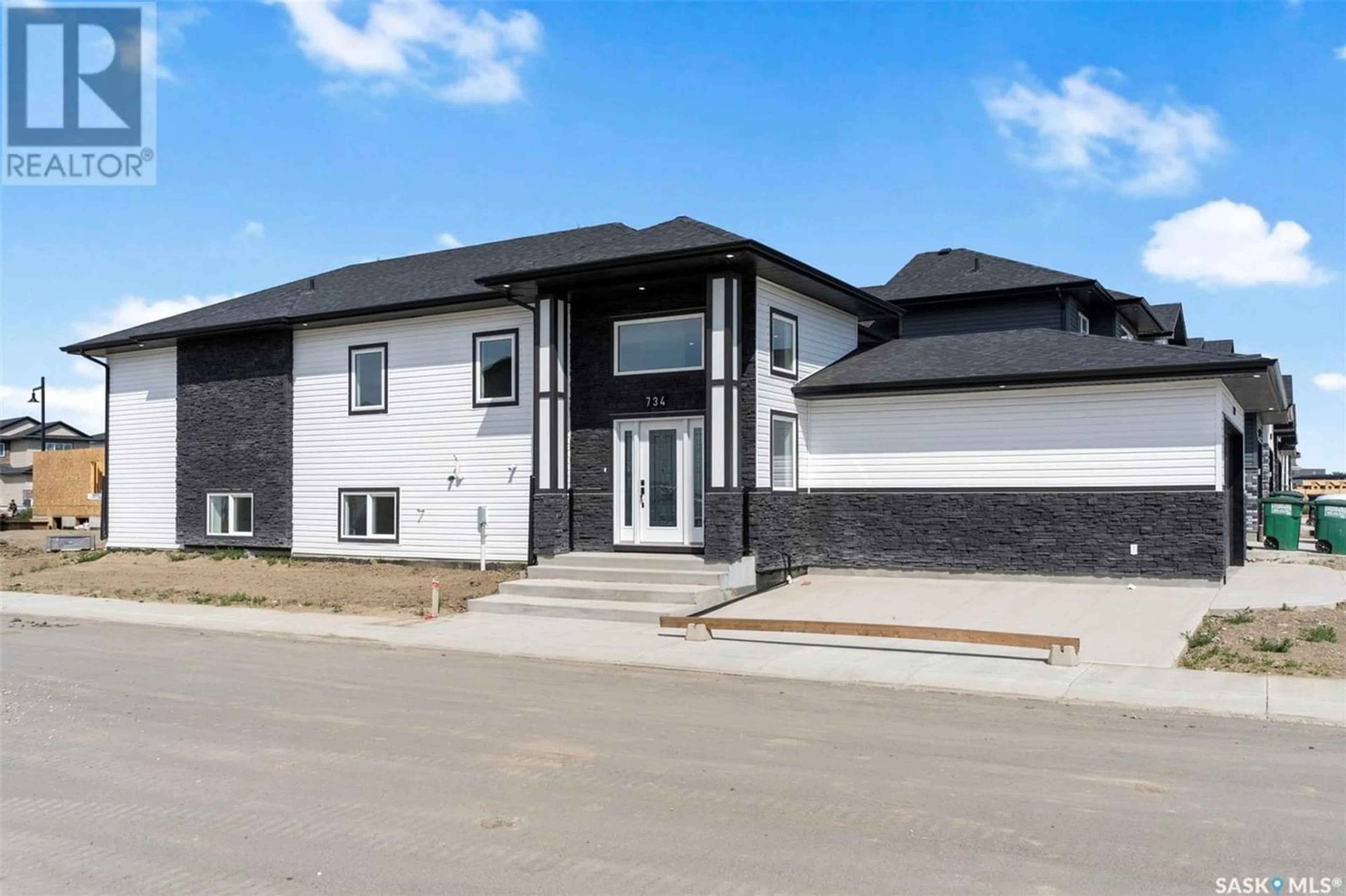 Frontside or backside of a home for 734 Delainey COURT, Saskatoon Saskatchewan S7W0T2