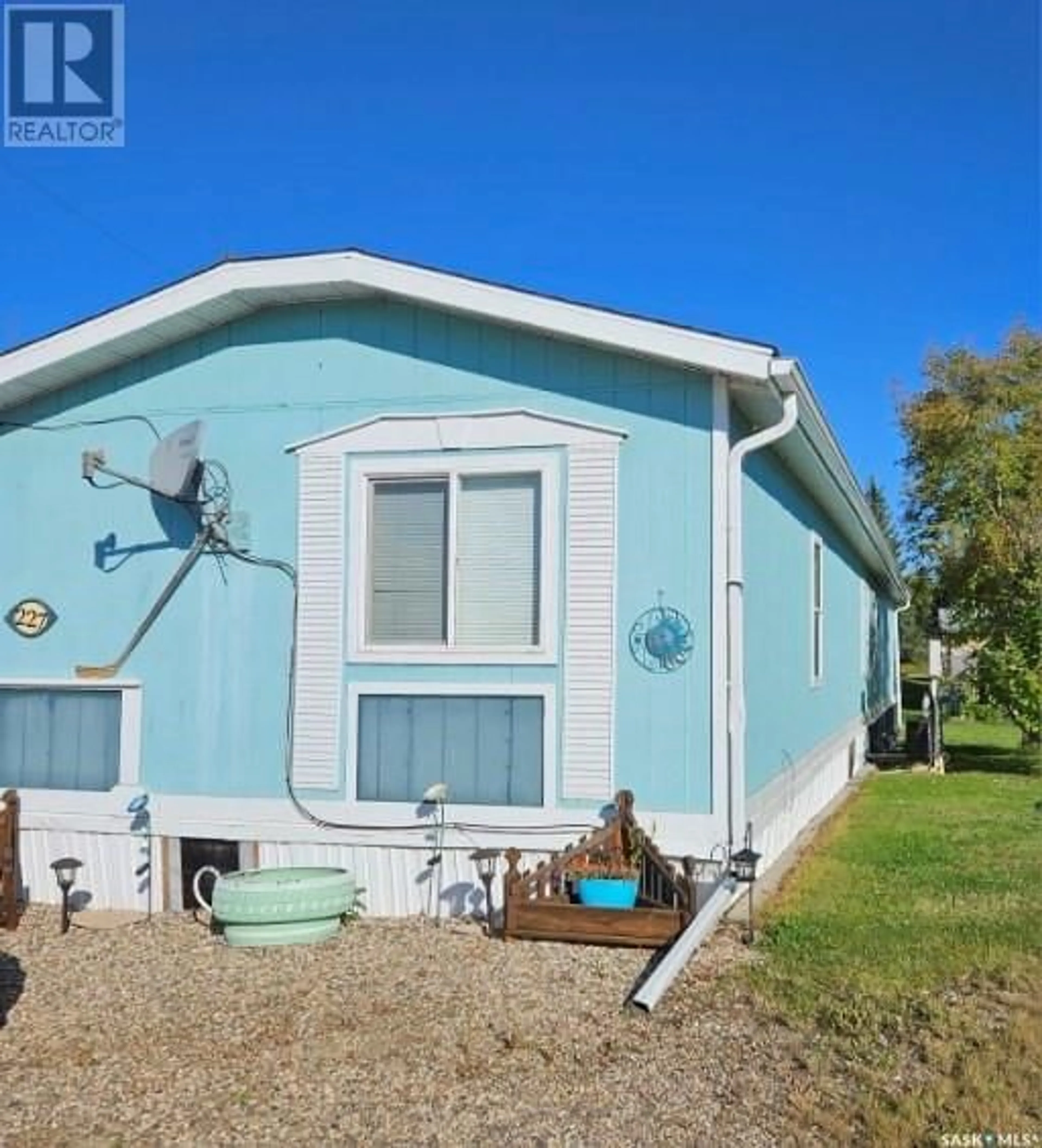 Home with vinyl exterior material for 227 Sundby CRESCENT, Big River Saskatchewan S0J0E0