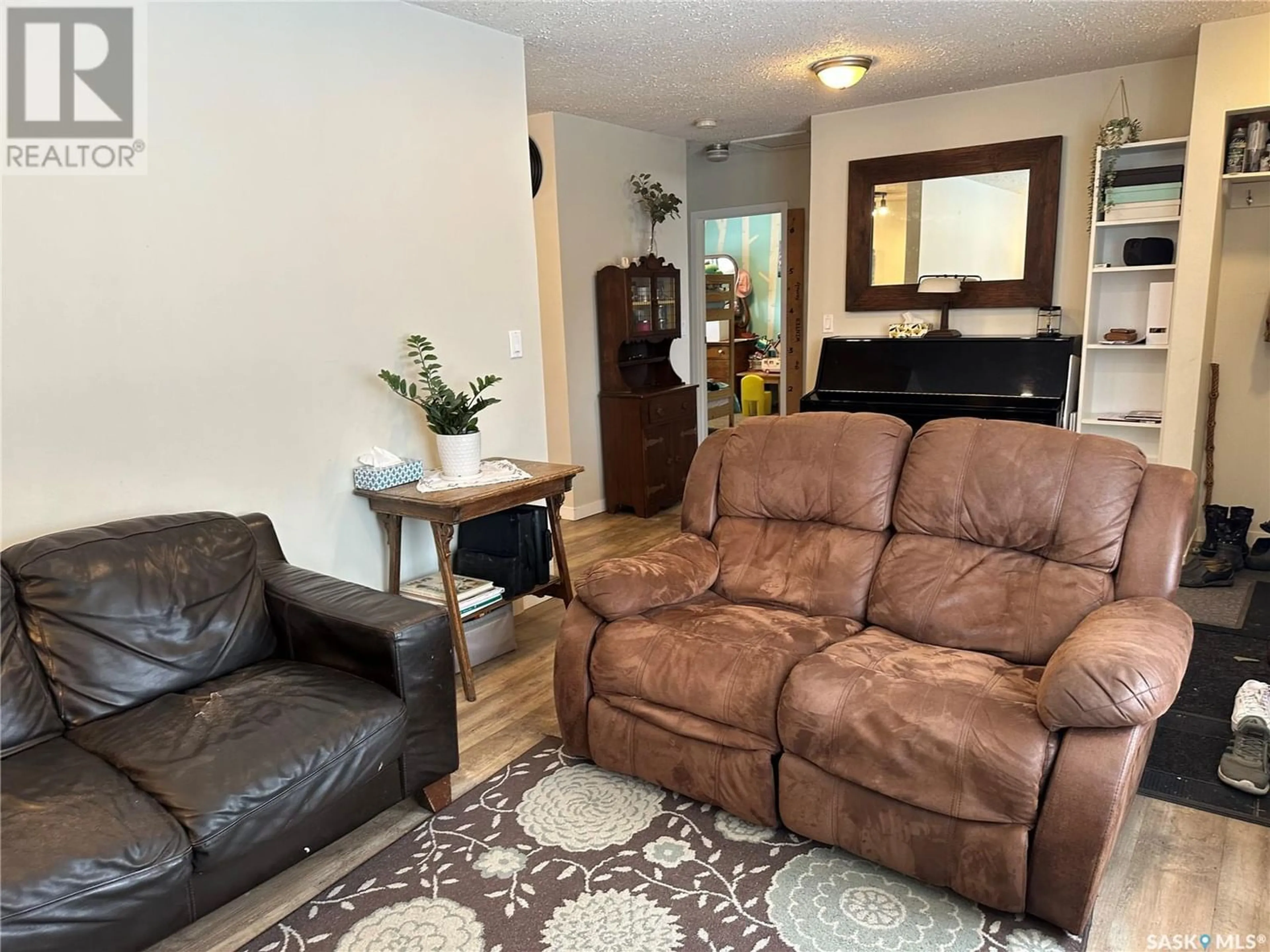 Living room for 502 2nd AVENUE E, Assiniboia Saskatchewan S0H0B0