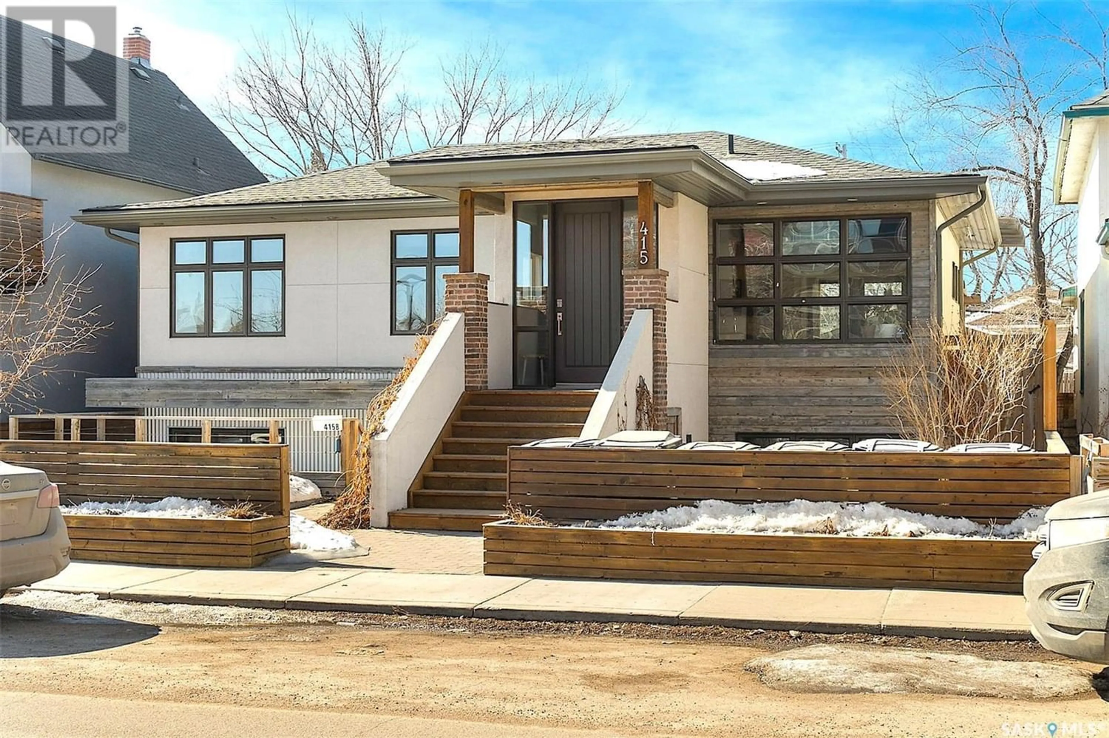 Frontside or backside of a home for 415 C AVENUE S, Saskatoon Saskatchewan S7M1N6