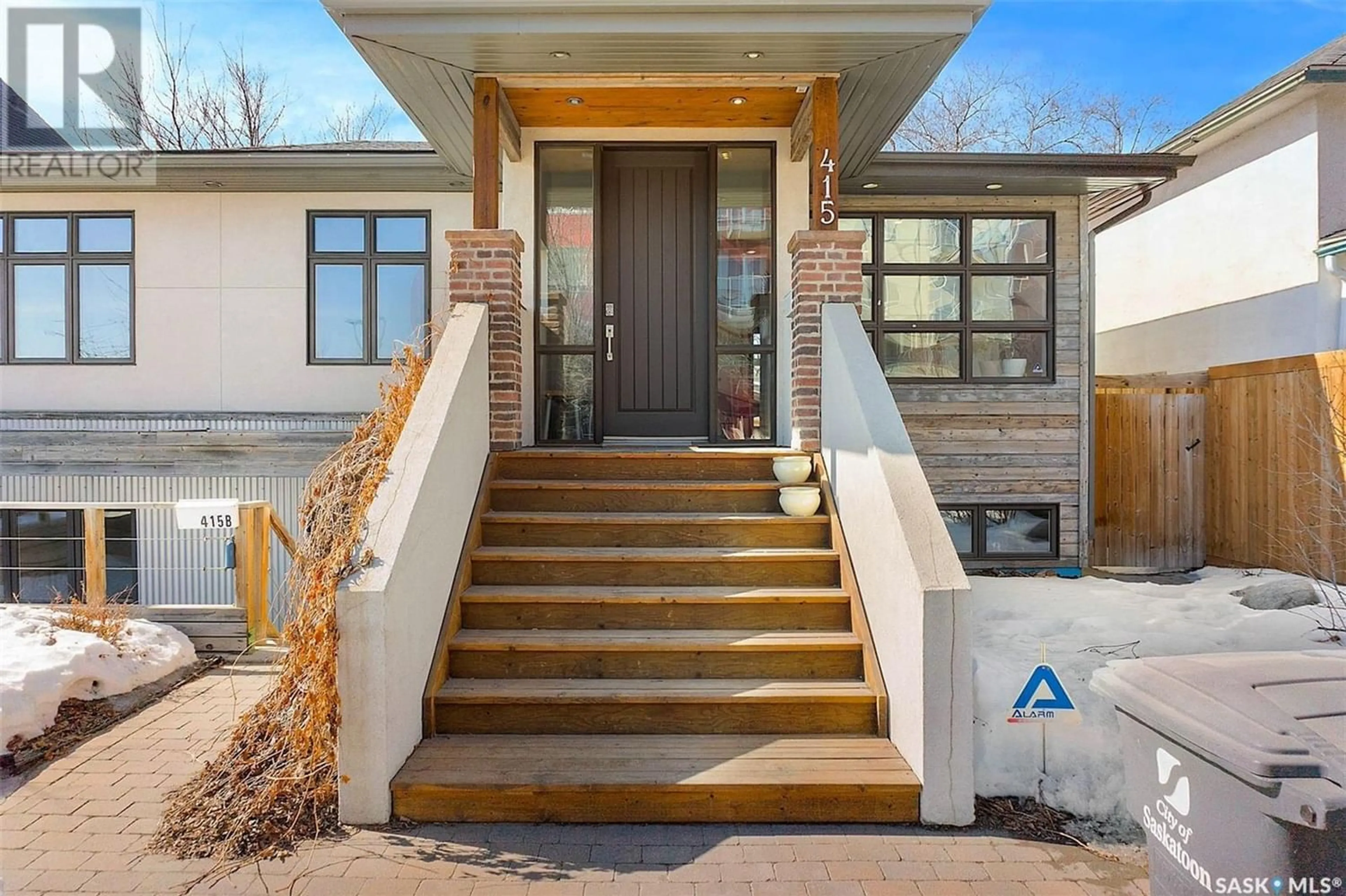 Home with brick exterior material for 415 C AVENUE S, Saskatoon Saskatchewan S7M1N6