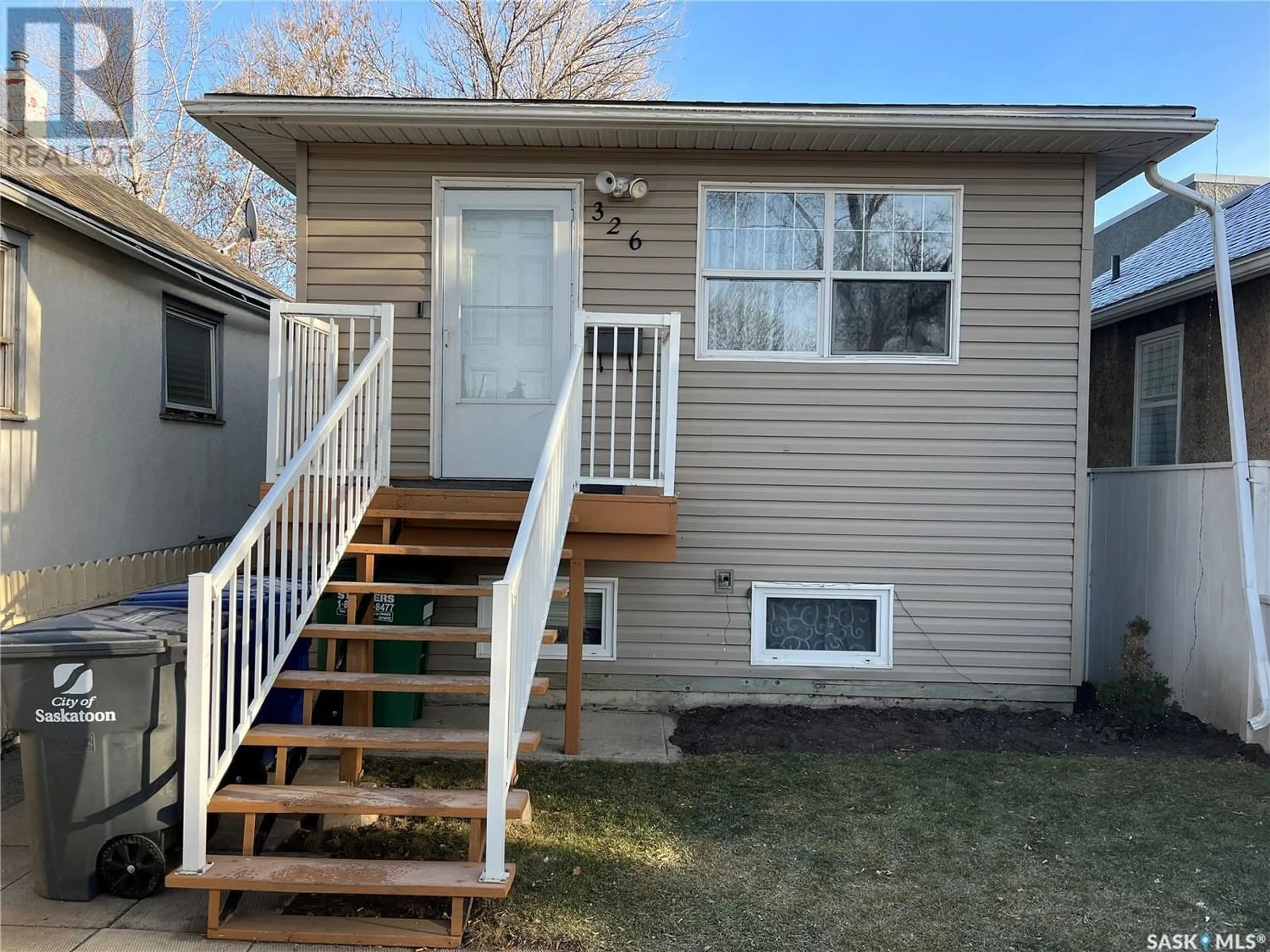 Frontside or backside of a home for 326 G AVENUE S, Saskatoon Saskatchewan S7M1V3