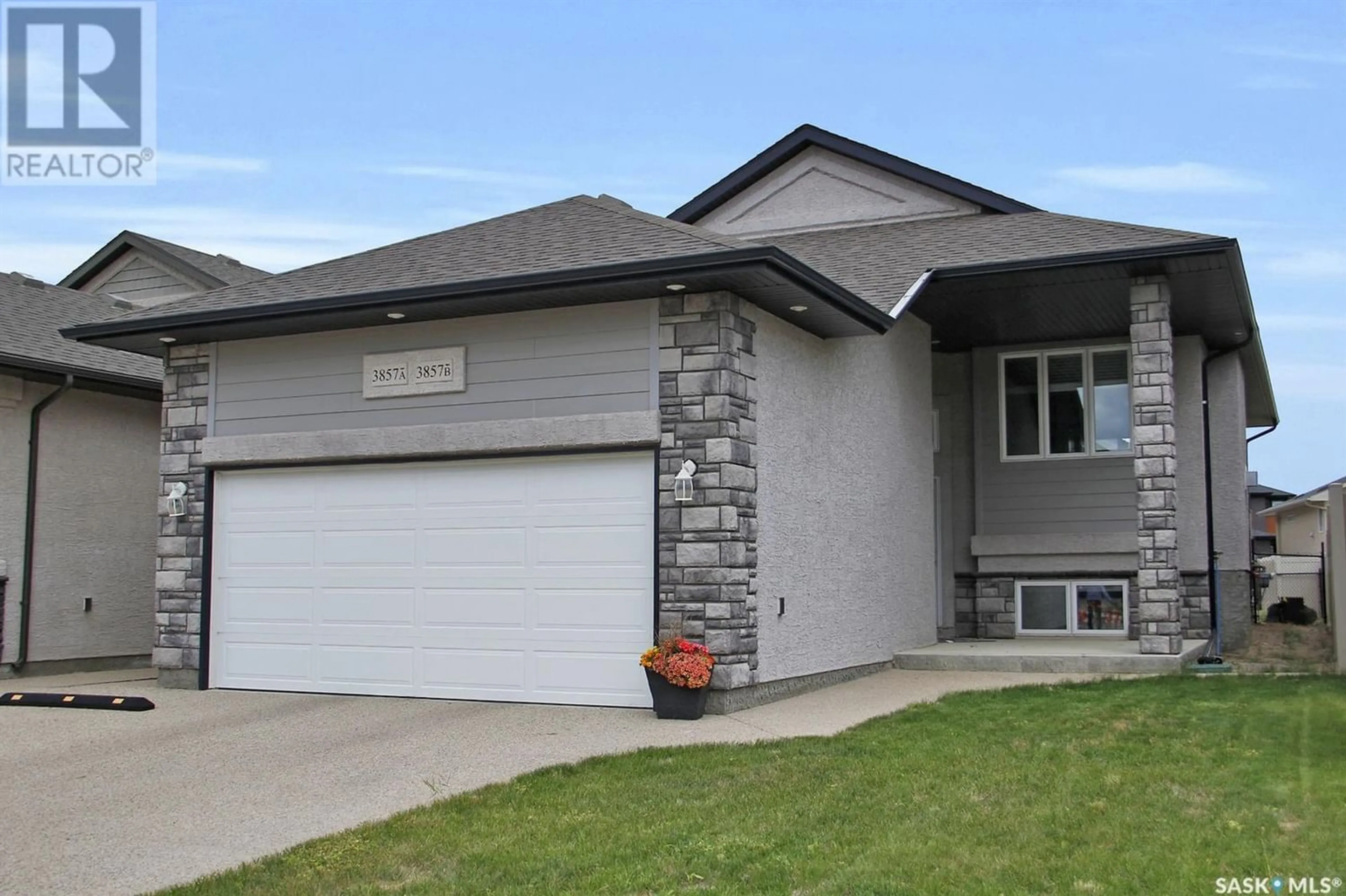 Frontside or backside of a home for 3857 Green Moss BAY, Regina Saskatchewan S4V1P7