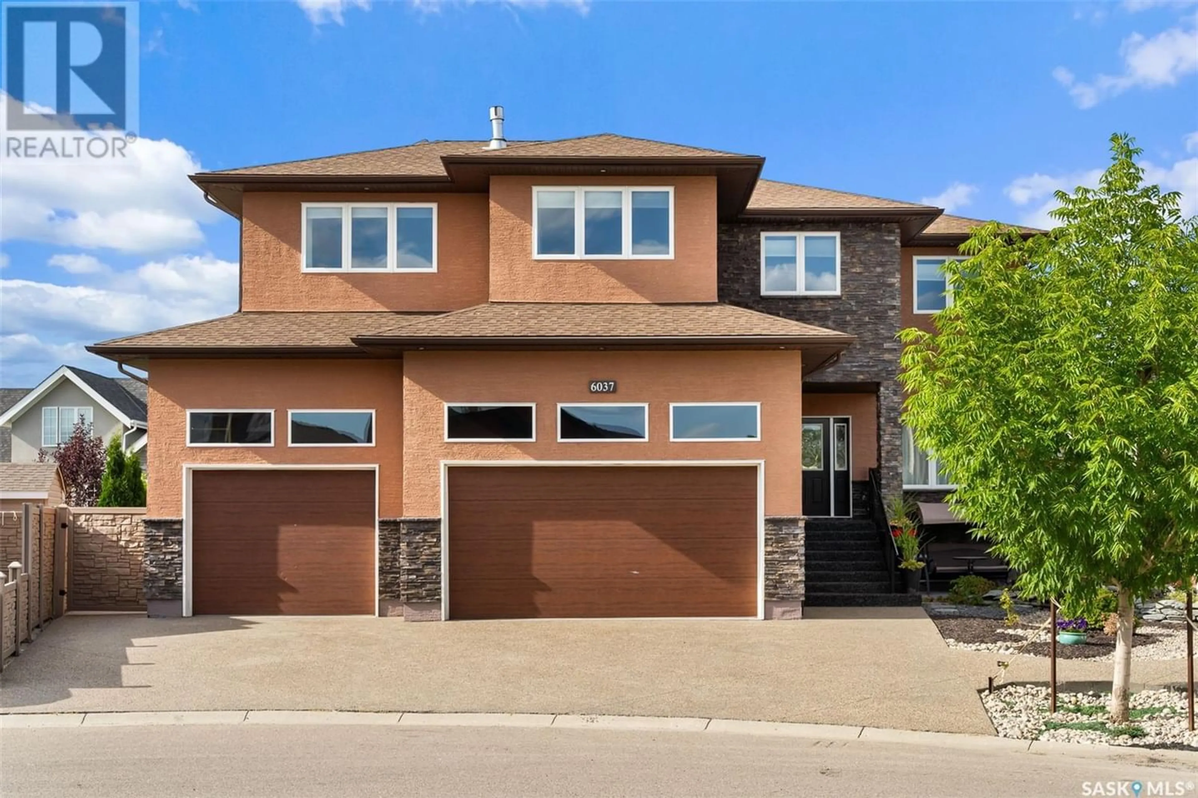 Home with brick exterior material for 6037 Eagles COVE, Regina Saskatchewan S4X0H5