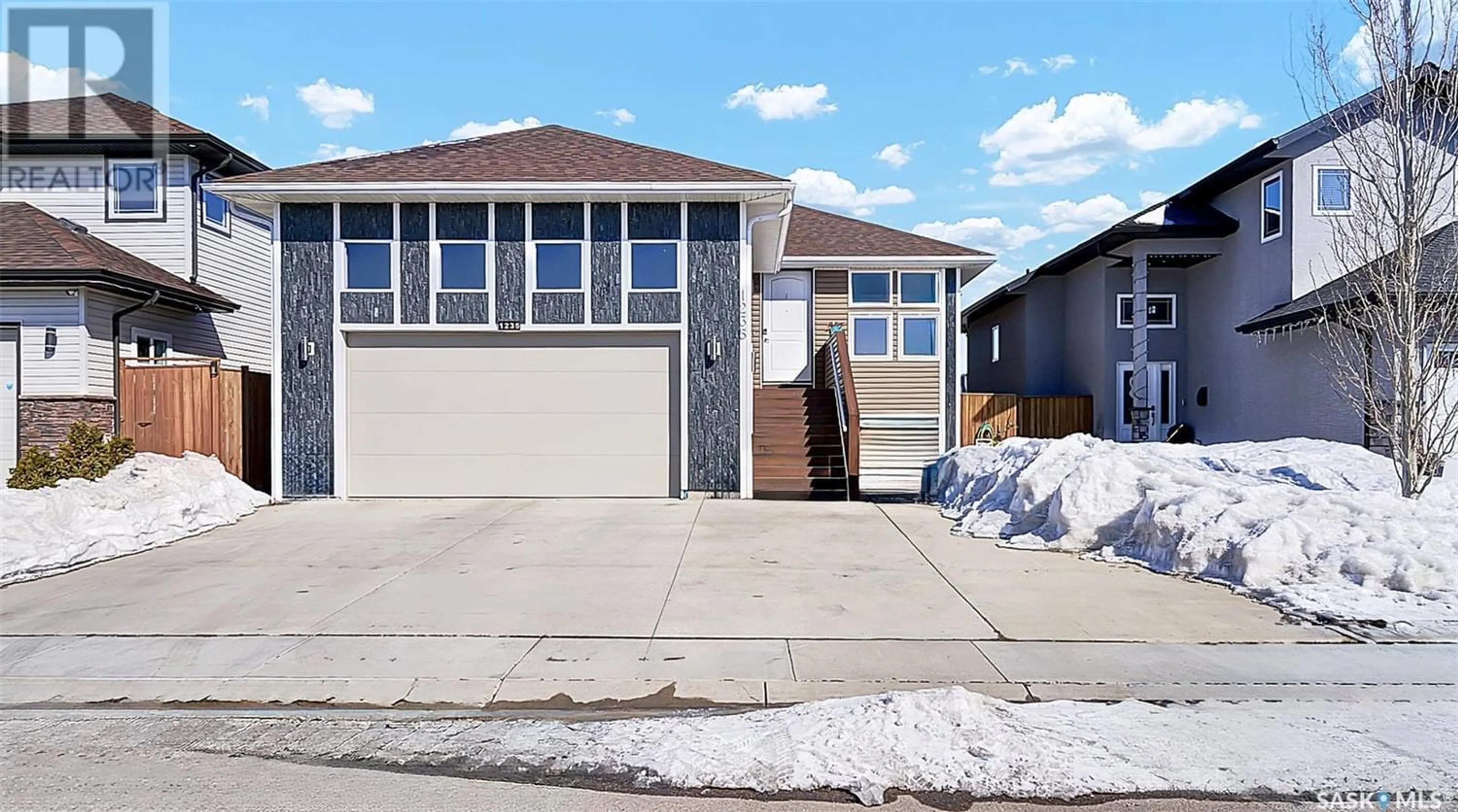 Frontside or backside of a home for 1235 Hargreaves WAY, Saskatoon Saskatchewan S7R0G9