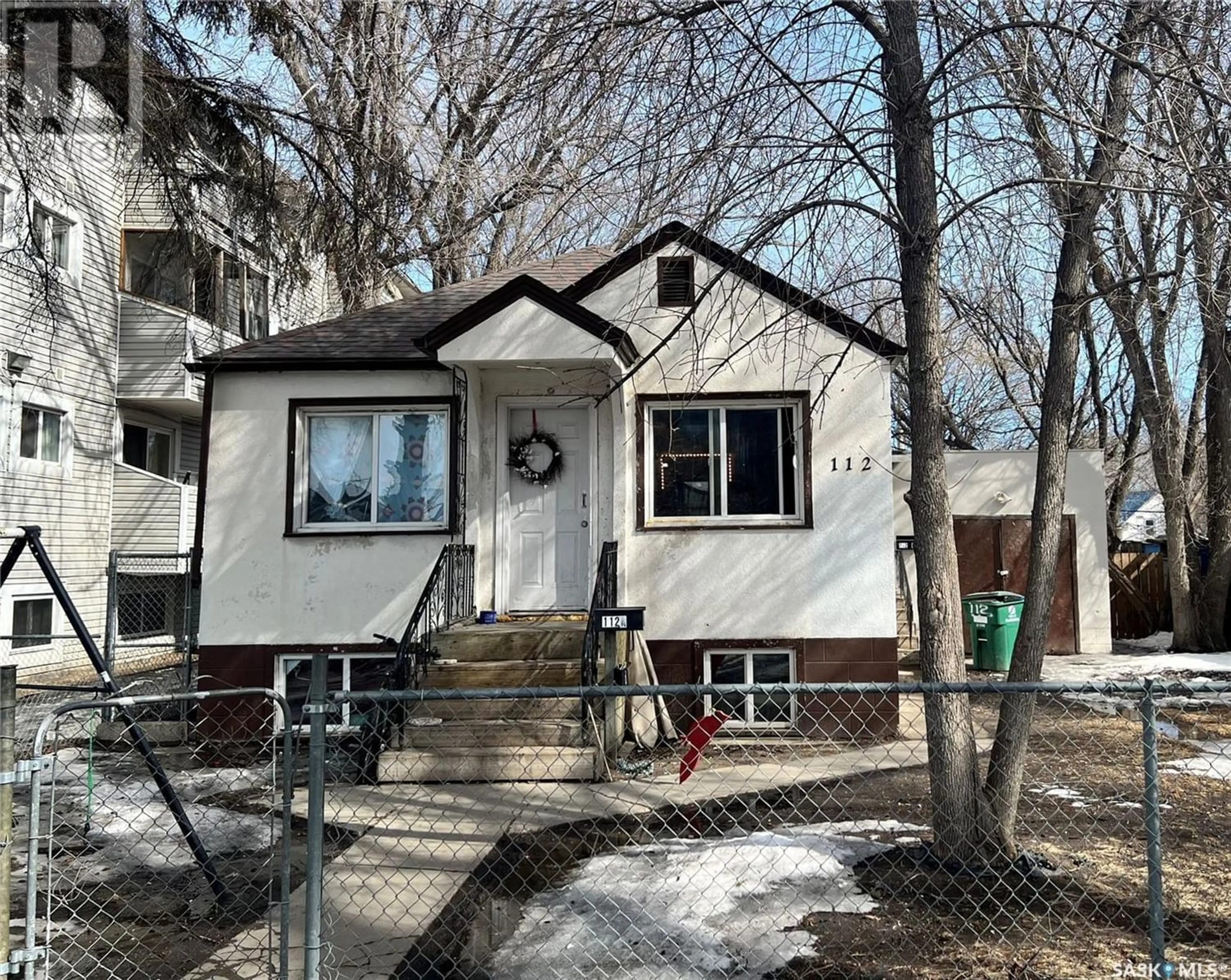 Frontside or backside of a home for 112 O AVENUE S, Saskatoon Saskatchewan S7M2R5