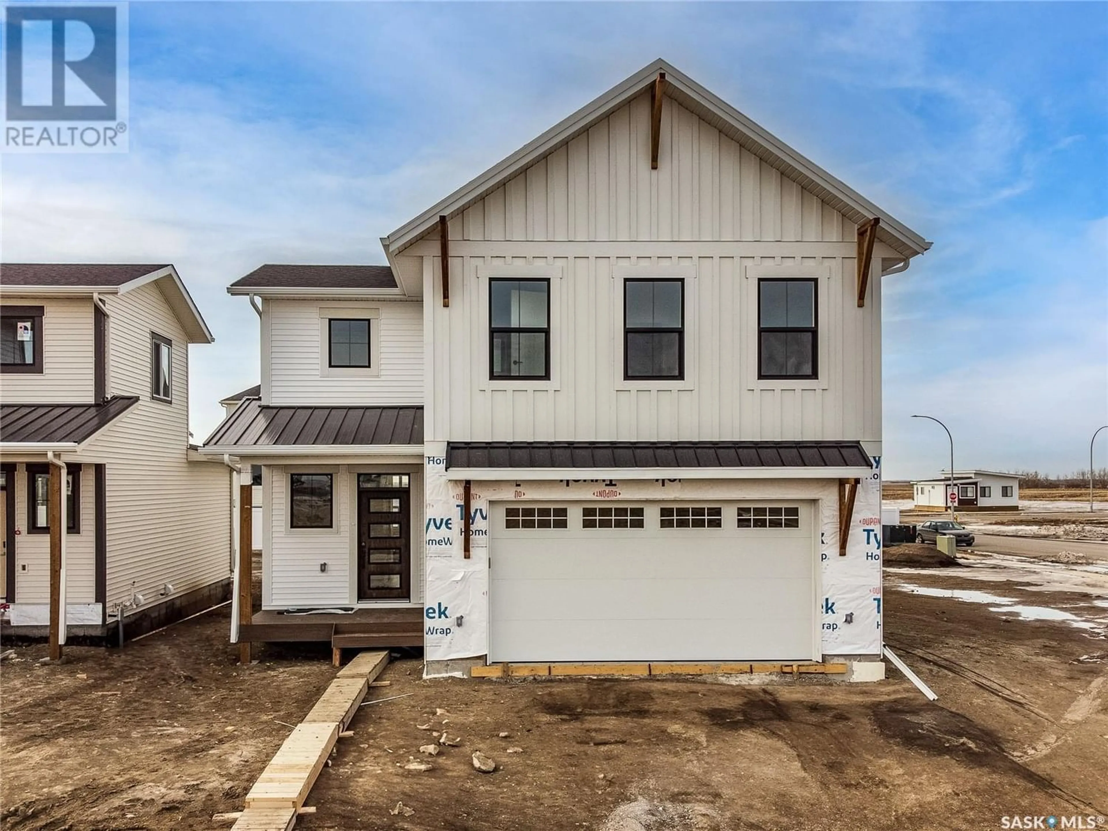 Frontside or backside of a home for 106 Haverstock CRESCENT, Saskatoon Saskatchewan S7W1E2