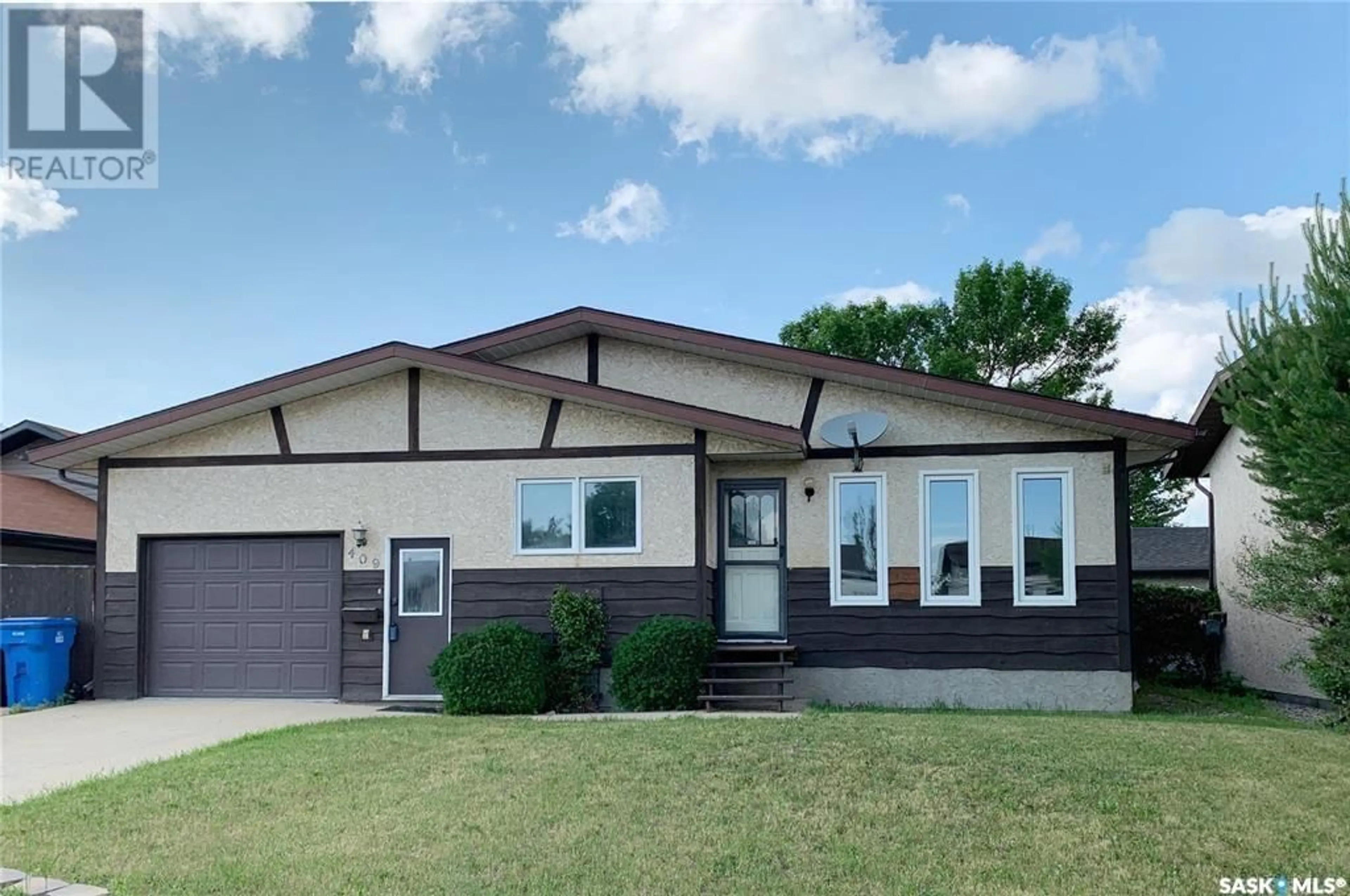 Home with vinyl exterior material for 409 Brooks ROAD, Estevan Saskatchewan S4A2P2