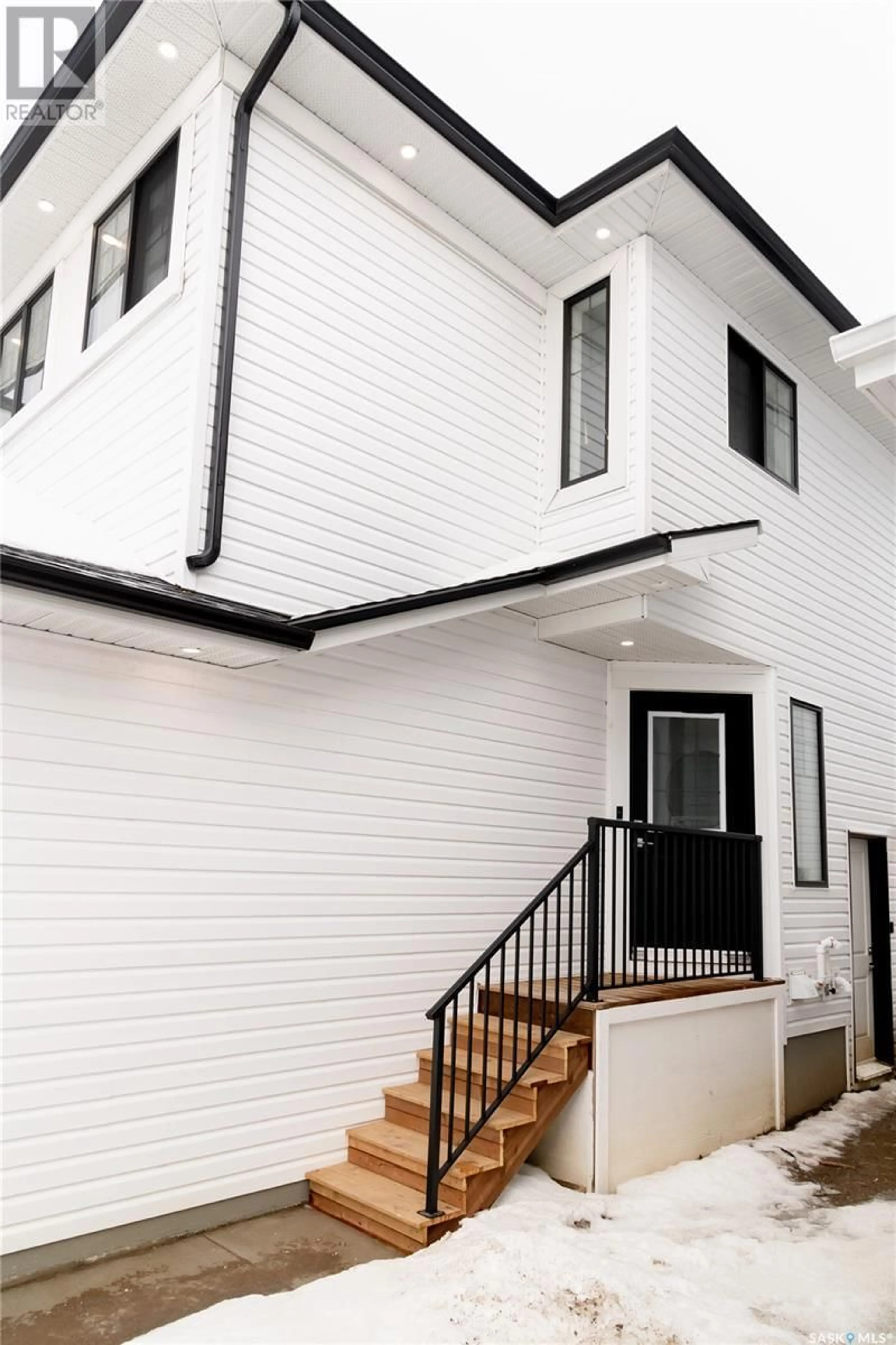 Home with brick exterior material for 206 Schmeiser BEND, Saskatoon Saskatchewan S7V1N6
