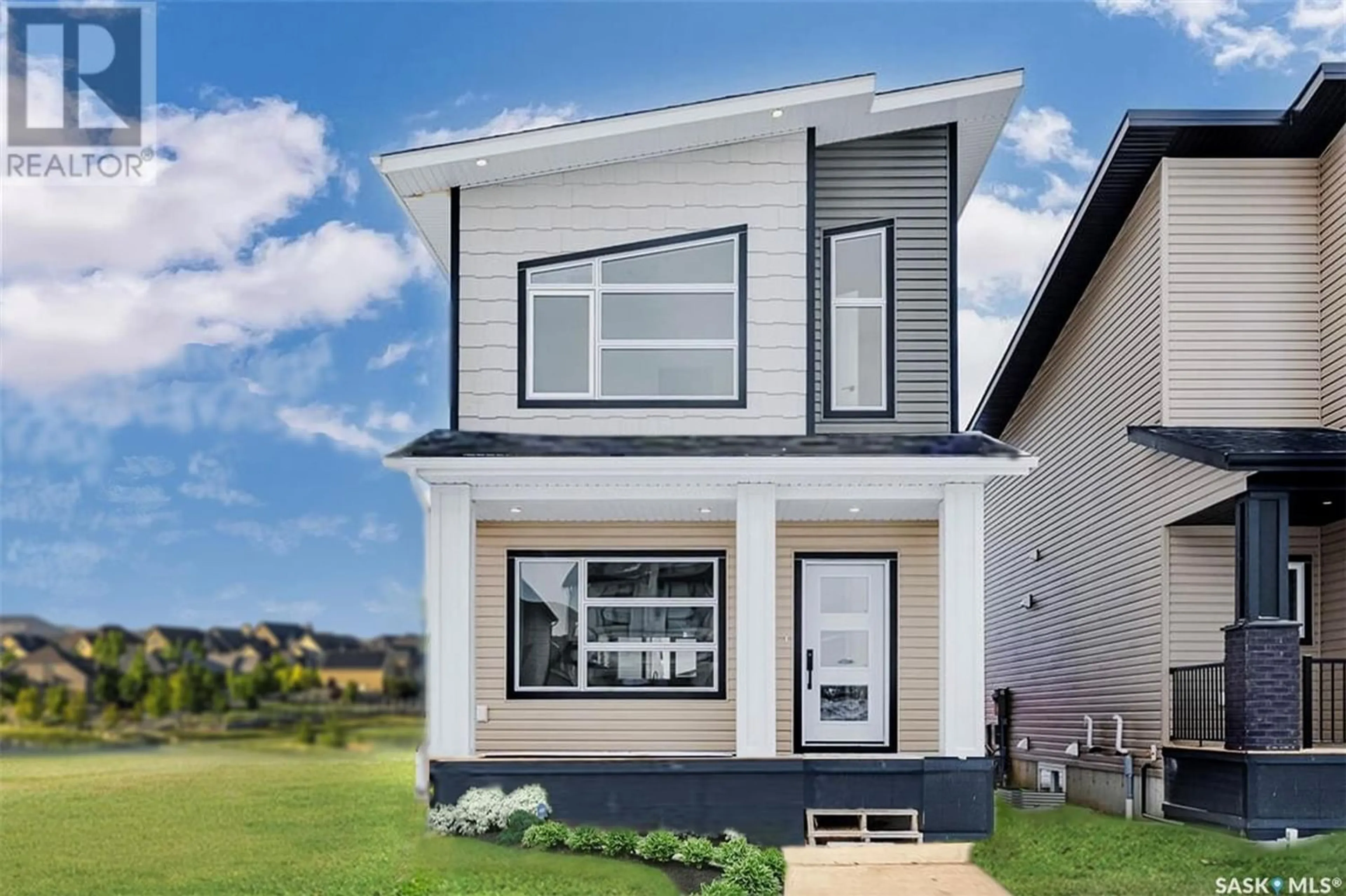 Home with vinyl exterior material for 138 Taube AVENUE, Saskatoon Saskatchewan S7V1L6