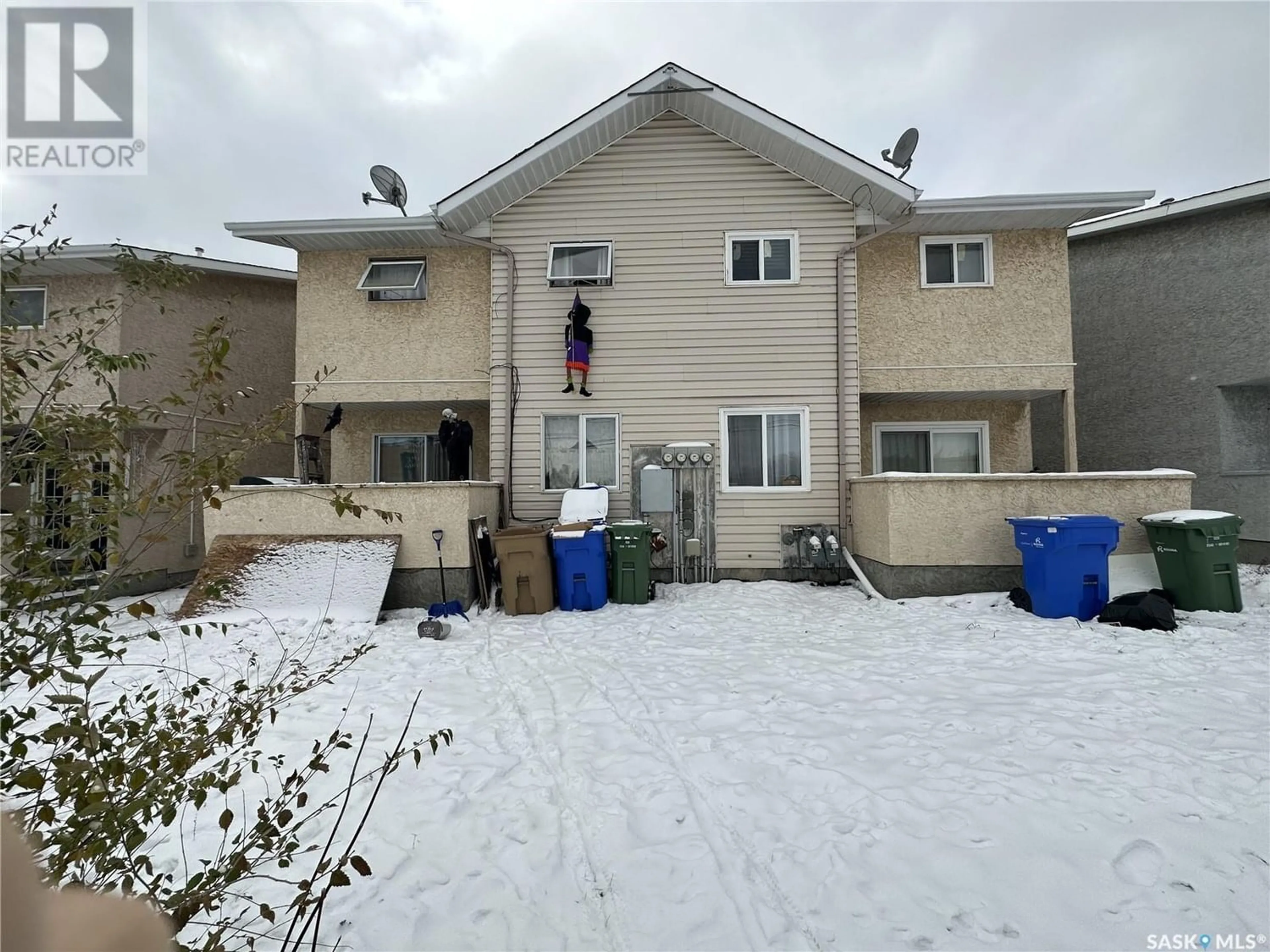 Frontside or backside of a home for 309 Angus STREET, Regina Saskatchewan S4R3K7