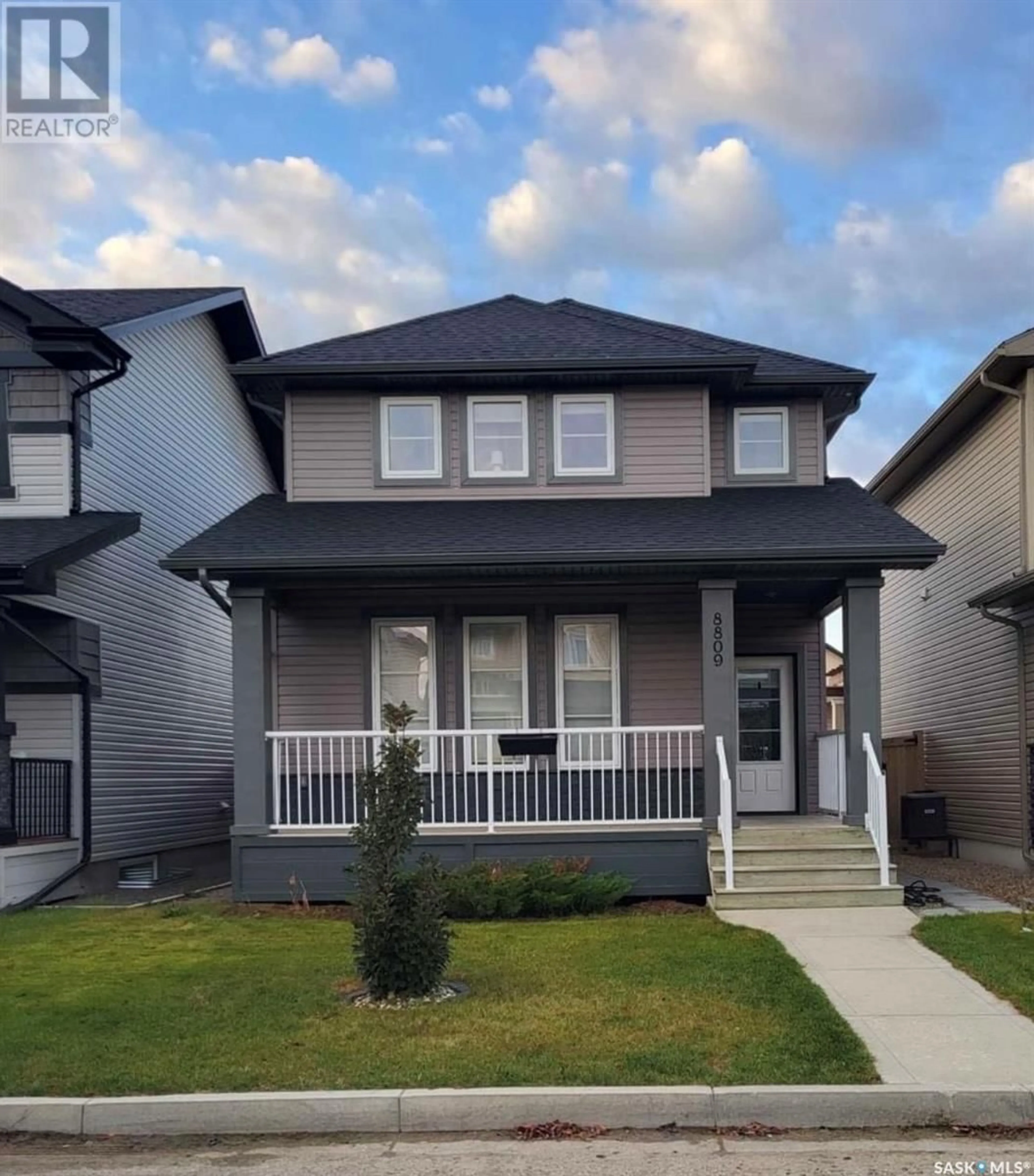 Frontside or backside of a home for 8809 Archer LANE, Regina Saskatchewan S4Y0B8