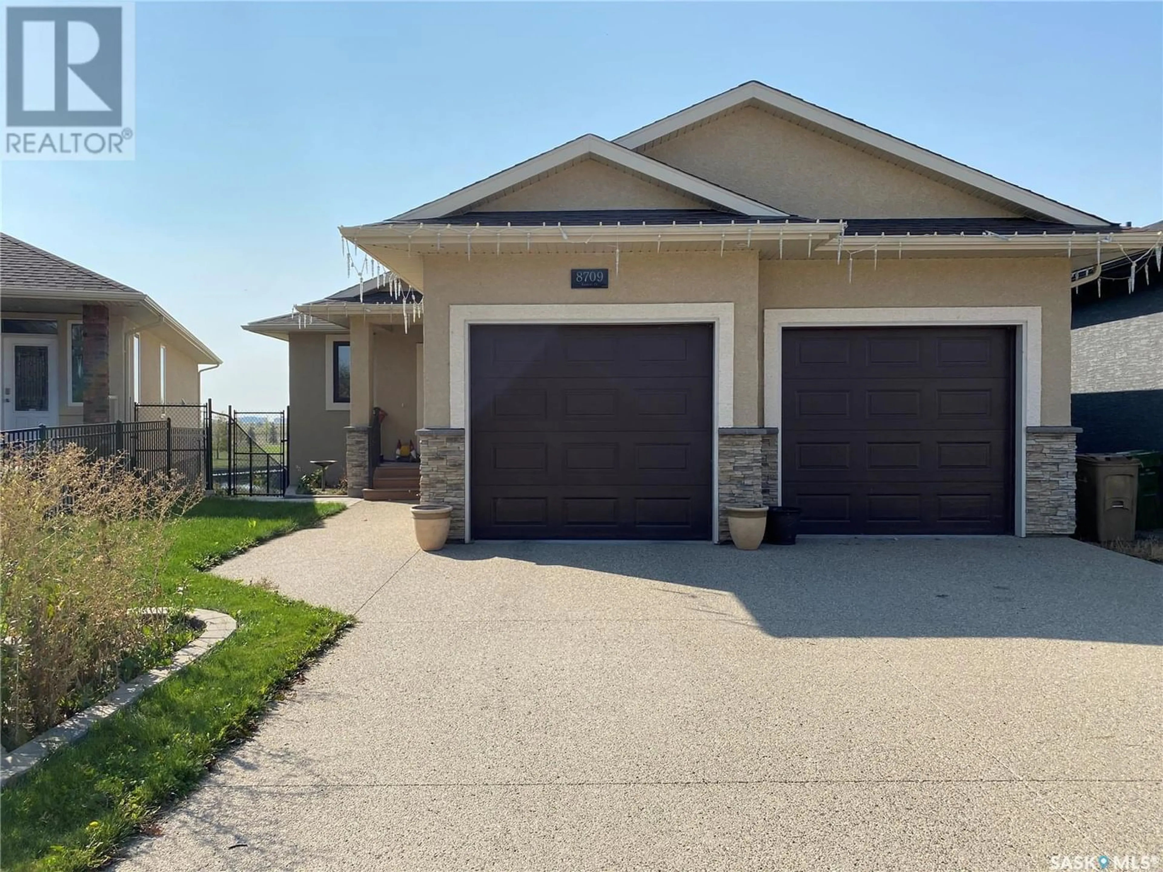 Frontside or backside of a home for 8709 KESTRAL DRIVE, Regina Saskatchewan S4Y1H6